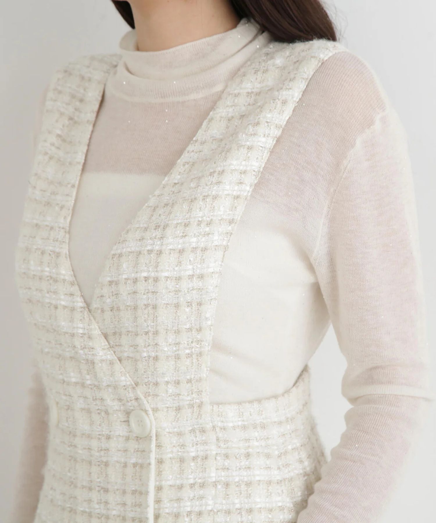 リープツイードジャンパースカート(エクリュ)毛 / ストレッチ無し / 前ボタンあき / ポケットあり / 裏地あり / 前裾ベンツあきあり / ふくらはぎ下くらいの丈 / 0315240009