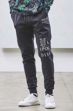 SPIRAL KNIT PANTS (チャコール) ポリエステル / ストレッチ / ロゴプリント / 軽量 /セットアップ対応 / 15011