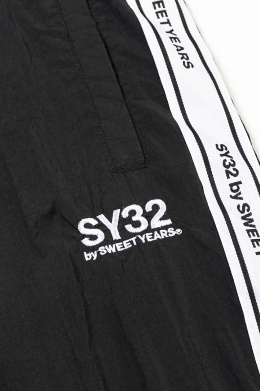 TAPE DESIGN NYLON PANTS  (ブラック) ナイロン / 軽量 / 裾ドローコード付き / セットアップ対応 / 15081RG