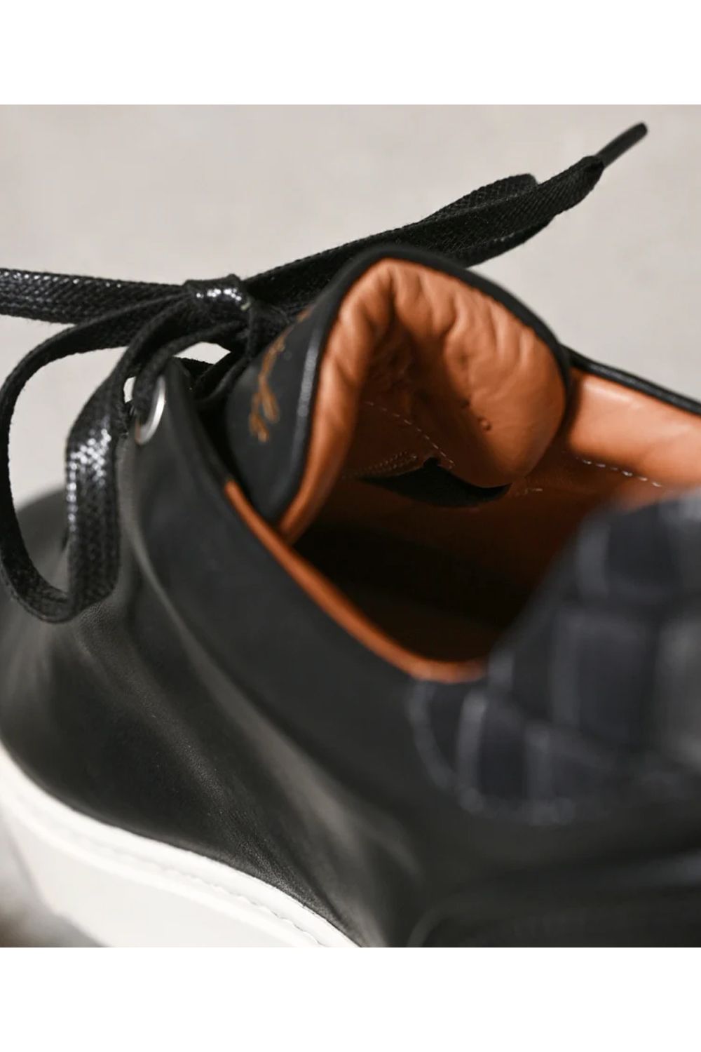 Hole cut sneakers