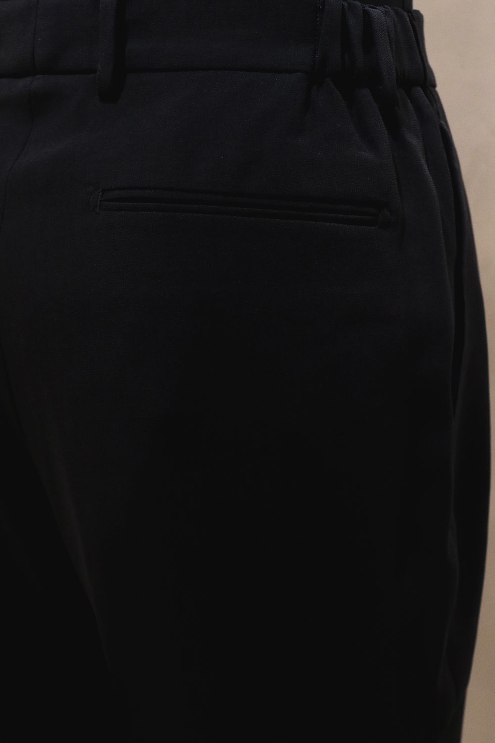 MELANGE TWILL SHIRRING TROUSERS / メランジ ツイル シャーリング トラウザーズ