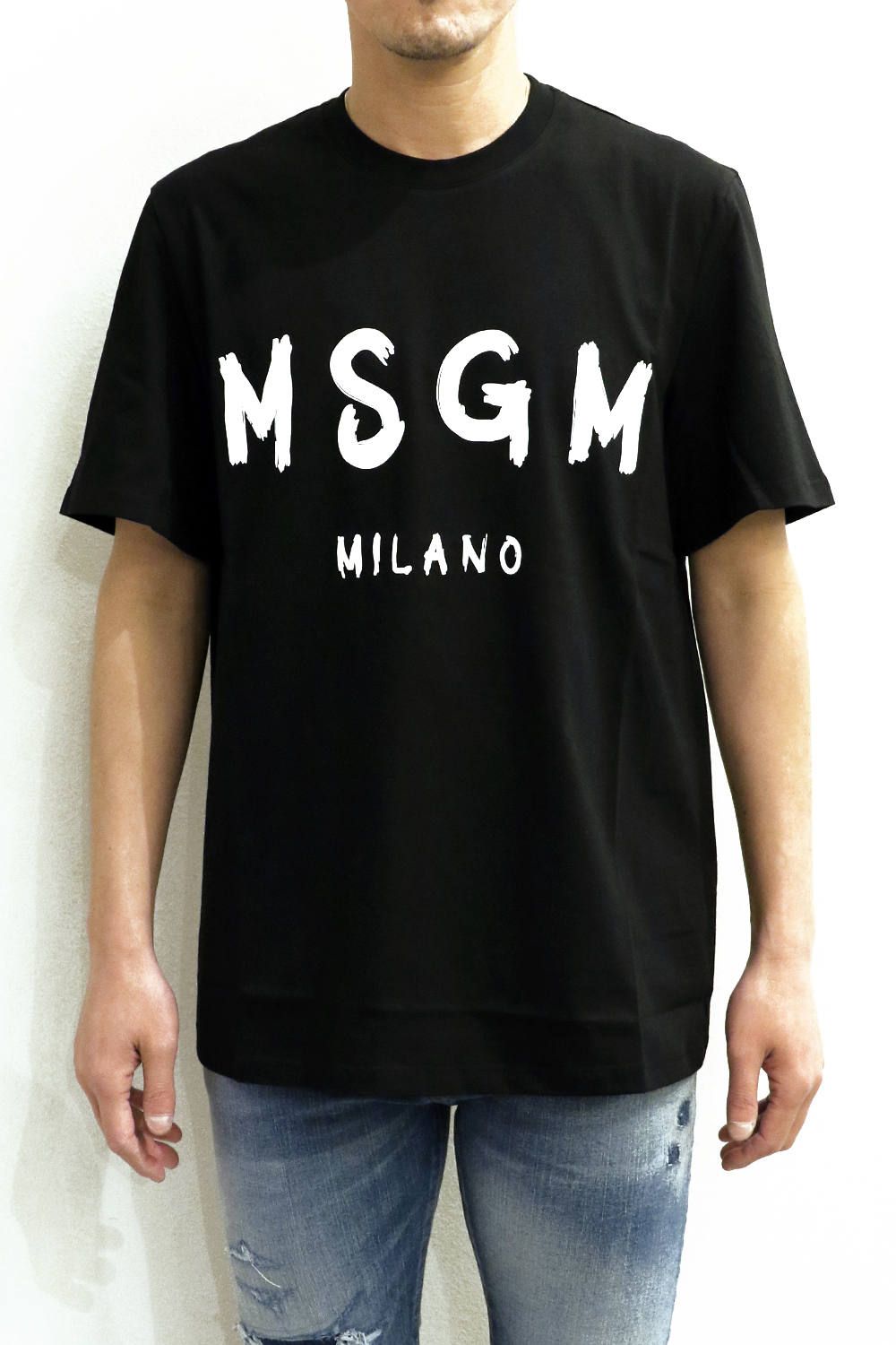 MSGM - T-SHIRT WITH BRUSHSTROKE LOGO | laid-back