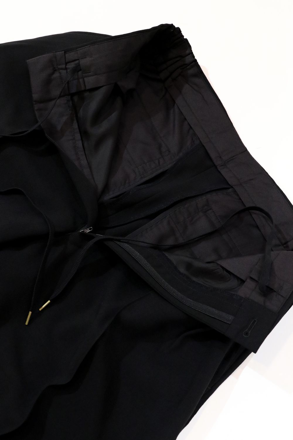 RAINMAKER - MELANGE TWILL SHIRRING TROUSERS / メランジ