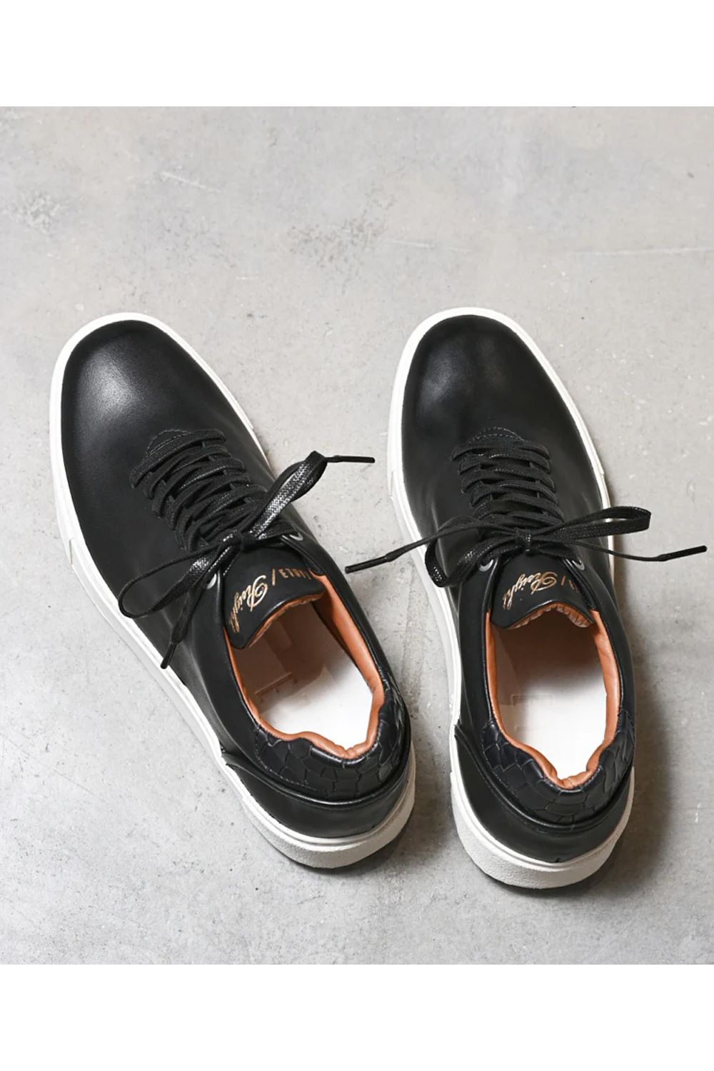 Hole cut sneakers