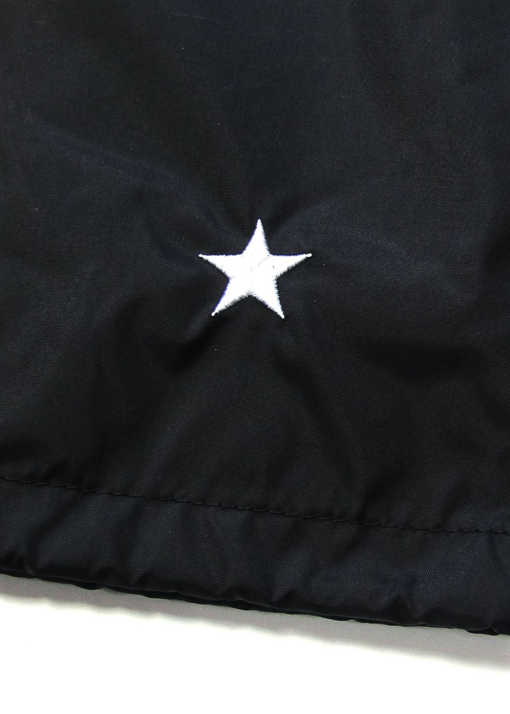 LOOPHOLE 20th ANNIVERSARY PRINT WINDBREAKER (BLACK) / ループホール20周年記念 コーチジャケット