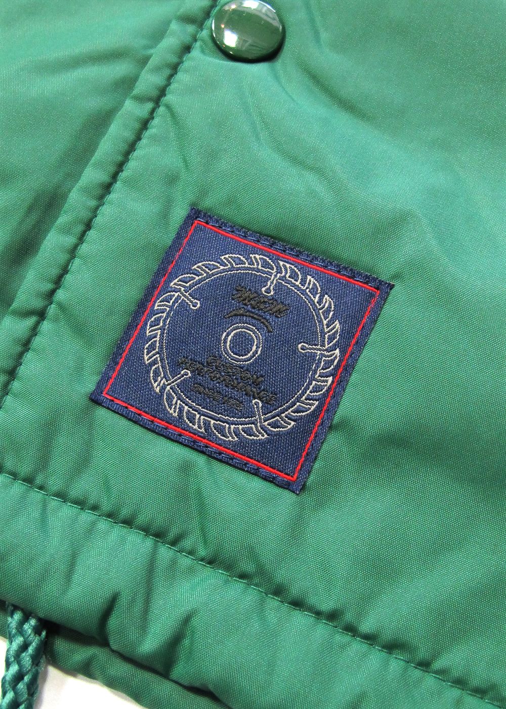 LOOPHOLE 20th ANNIVERSARY PRINT WINDBREAKER (IVY GREEN) / ループホール20周年記念 コーチジャケット