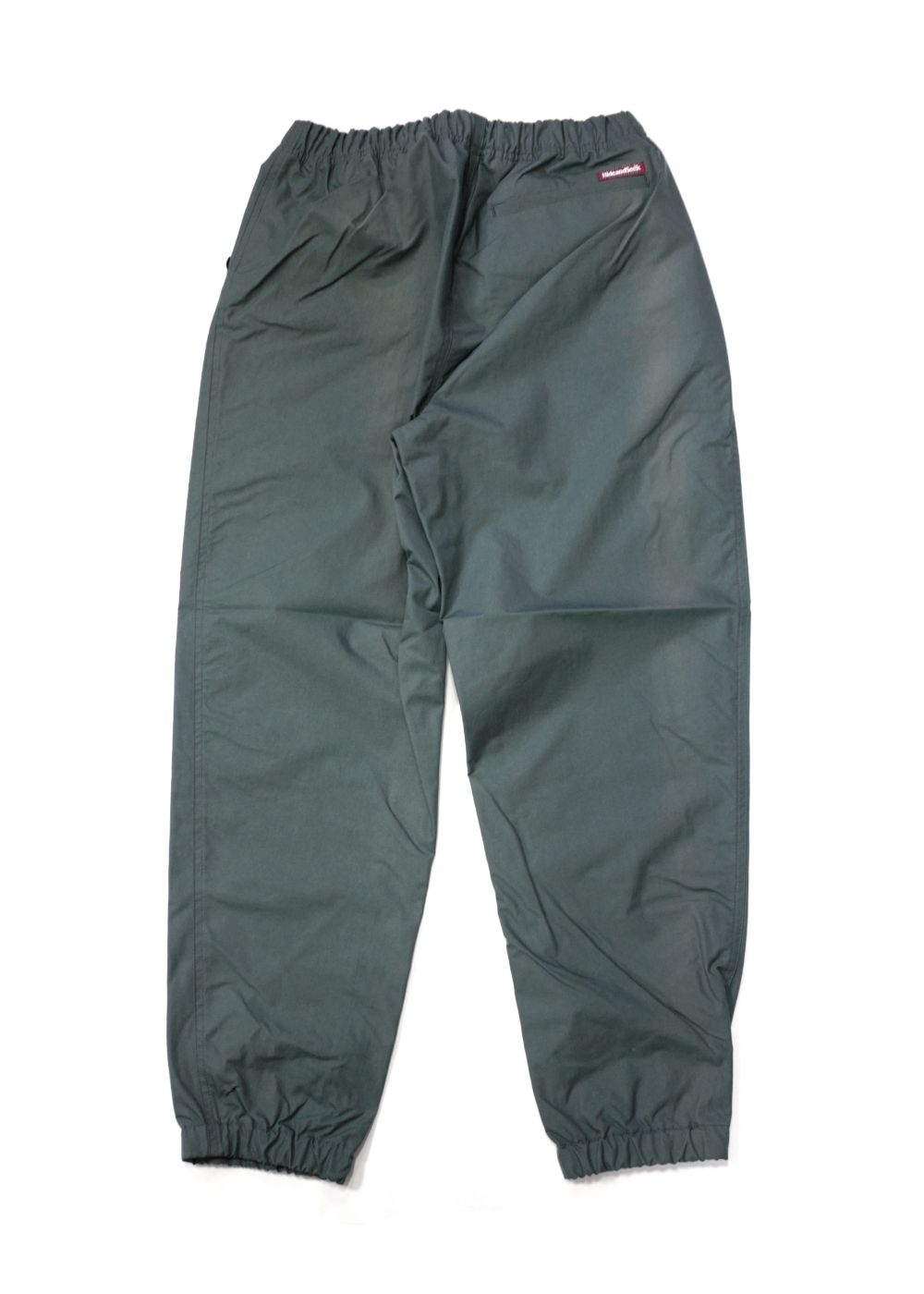 HIDE AND SEEK - NYLON TRACK PANTS (GRAY) / ナイロントラックパンツ