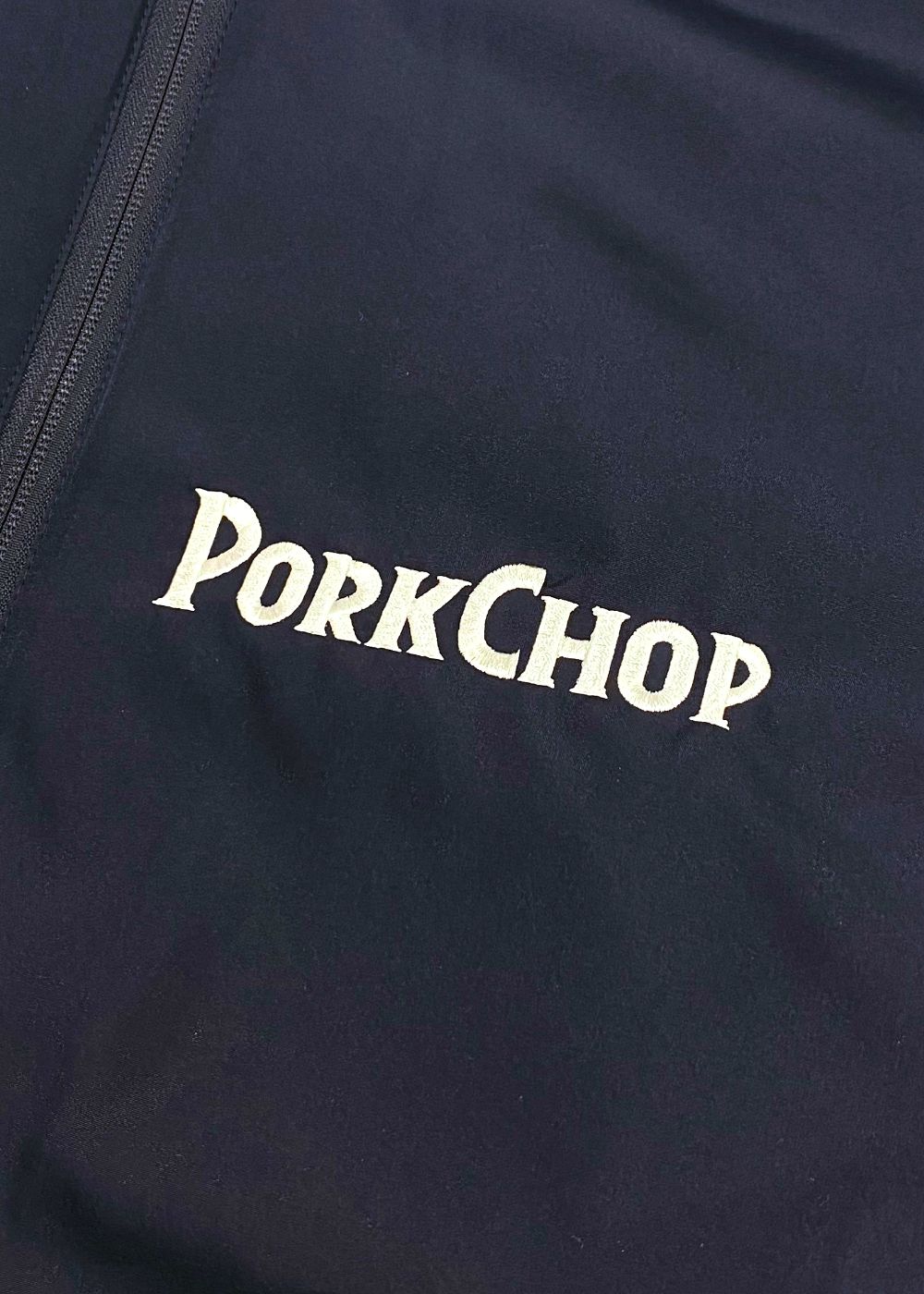 BURNING LOGO HOODED JKT (NAVY) / フーデッド パフ ジャケット