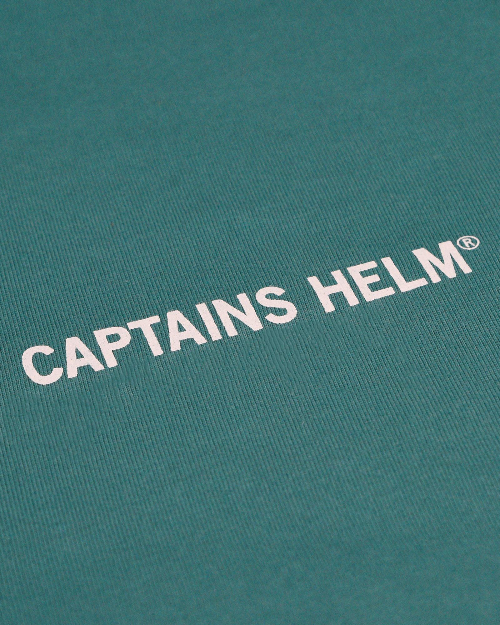 TRADEMARK LOGO LS TEE (GREEN) / ロゴ プリント ロンT