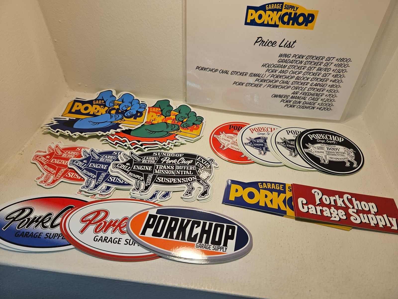 PORKCHOP - 2nd Oval STICKER (NAVY×ORANGE) / ロゴステッカー | LOOPHOLE