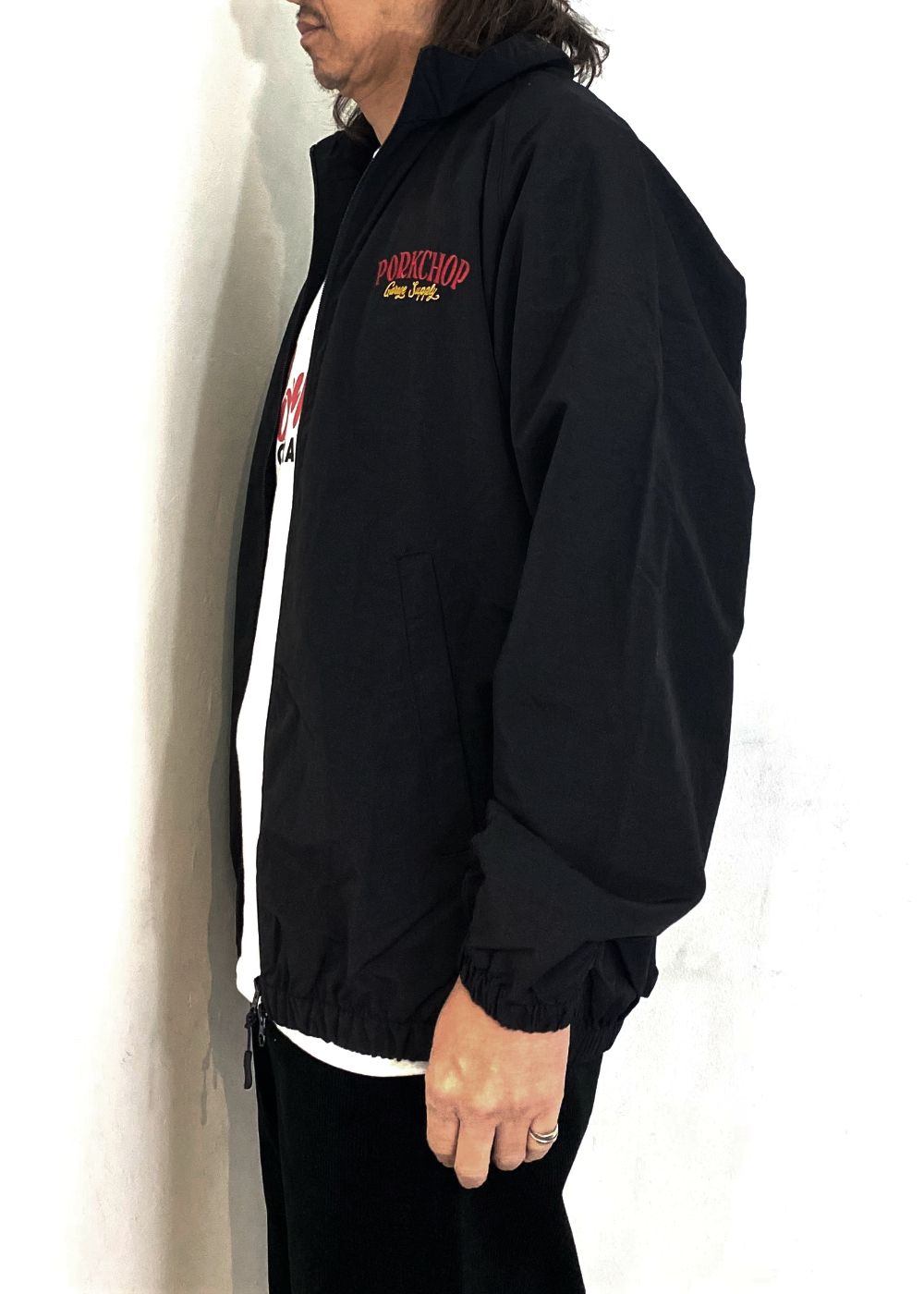 PORK BACK NYLON JKT (BLACK) / ポークバック ナイロン トラック ジャケット