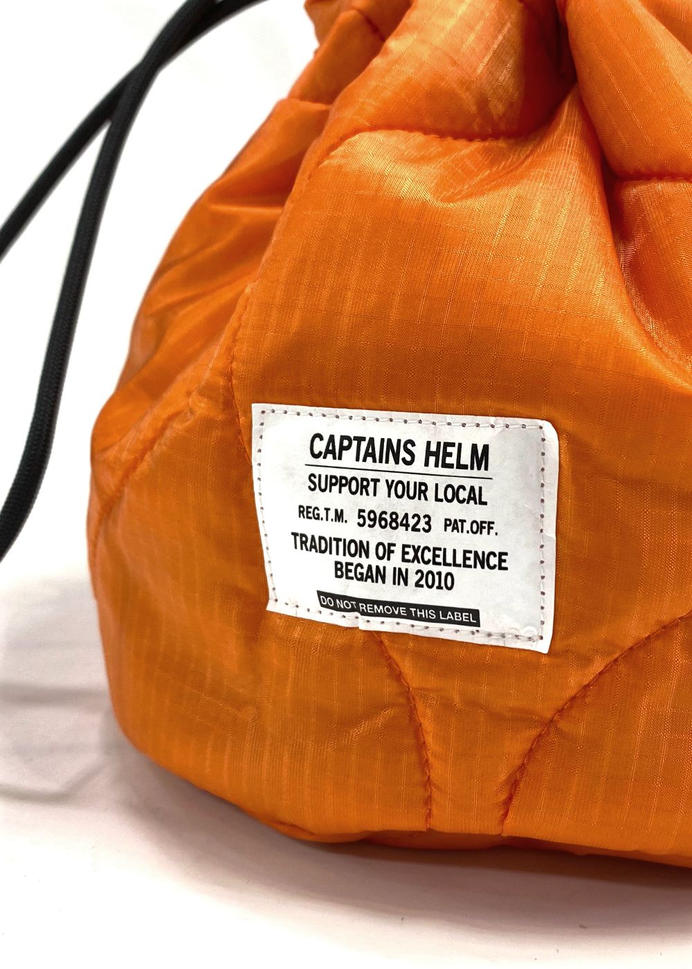 QUILTING KINCHAKU (ORANGE) / キルティング 巾着ポーチ