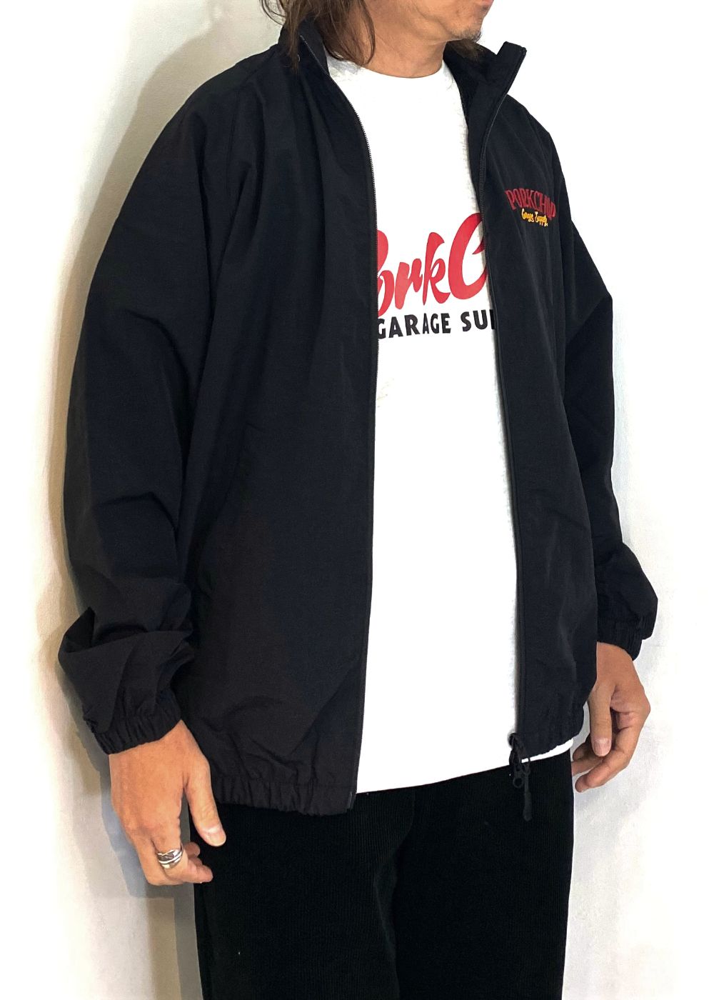 PORK BACK NYLON JKT (BLACK) / ポークバック ナイロン トラック ジャケット