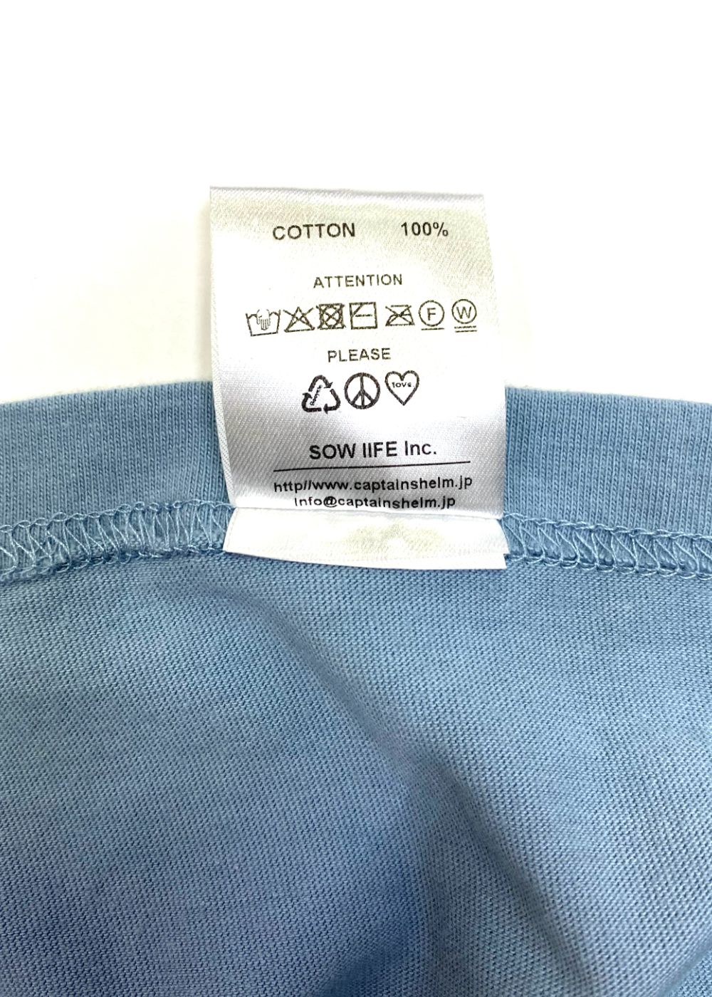 TRADEMARK LOGO LS TEE (LIGHT BLUE) / ロゴ プリント ロンT