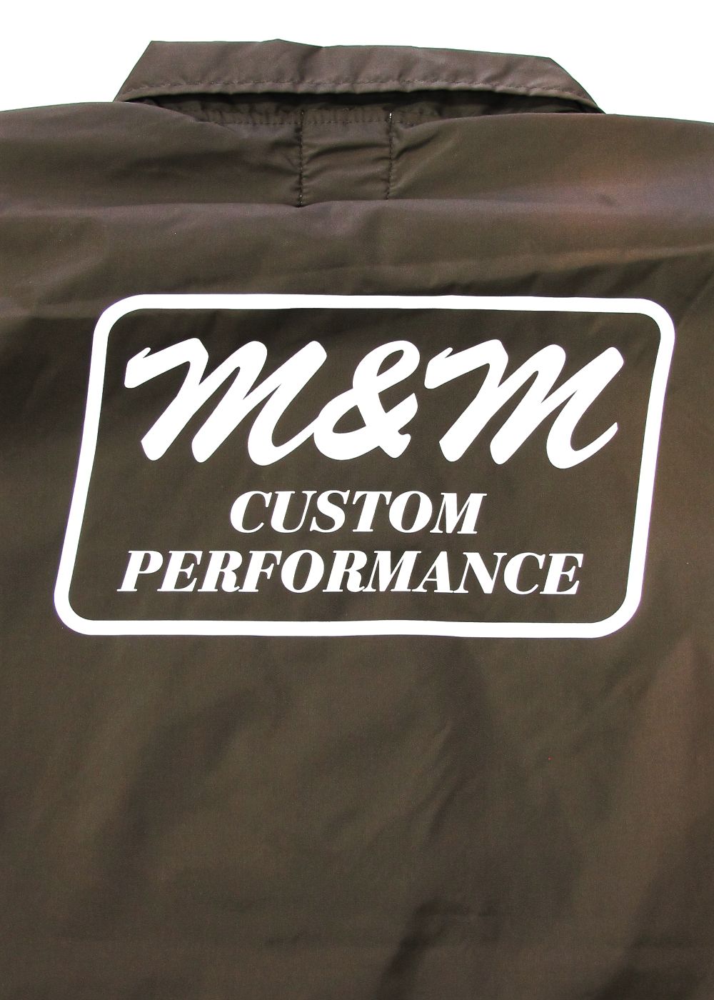 LOOPHOLE 20th ANNIVERSARY PRINT WINDBREAKER (SEAL BROWN) / ループホール20周年記念 コーチジャケット