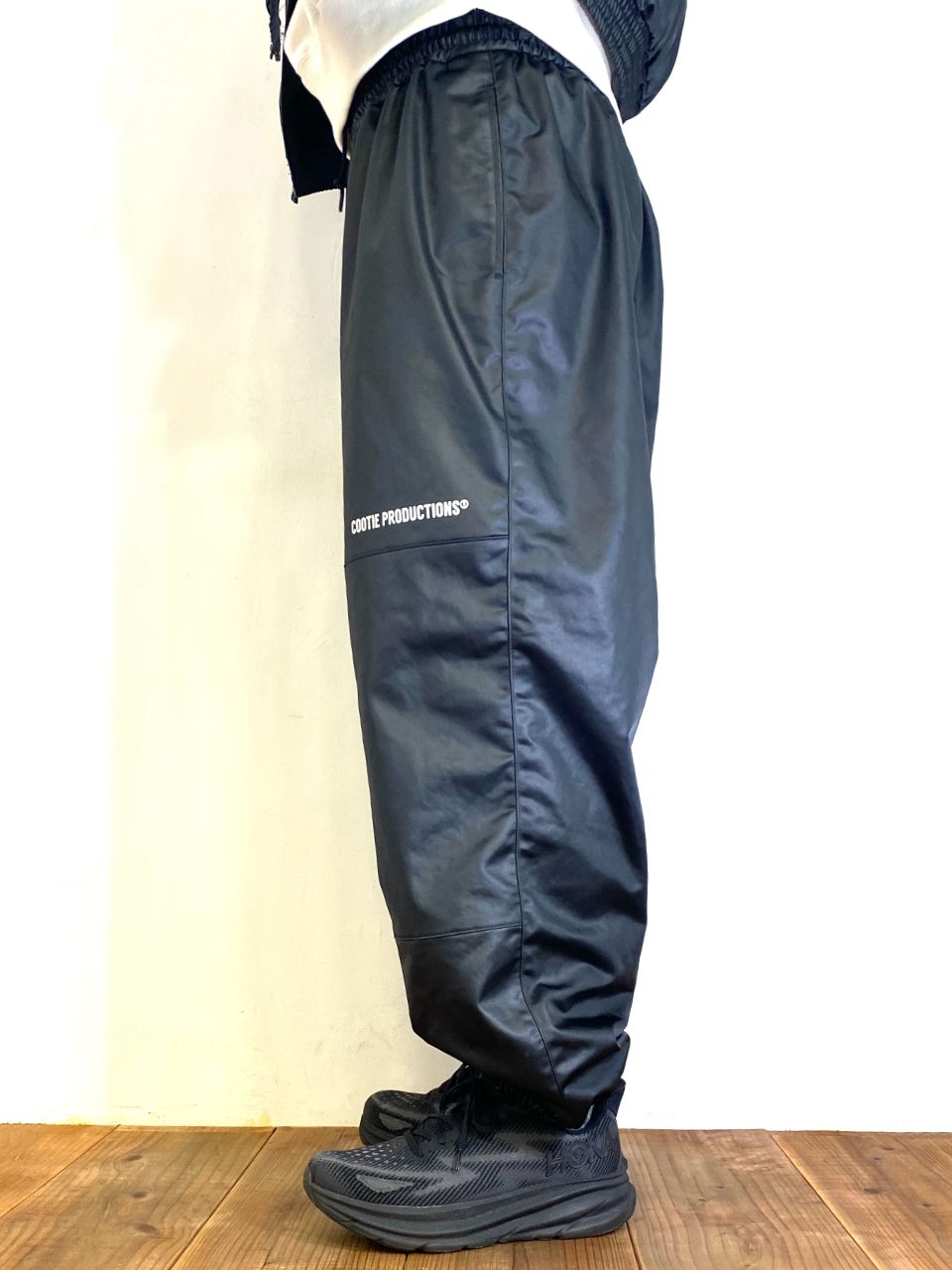 COOTIE PRODUCTIONS - Damp Coated Satin Wide Track Pants COOTIE PRODUCTIONS - Damp Coated Satin Wide Track Pants