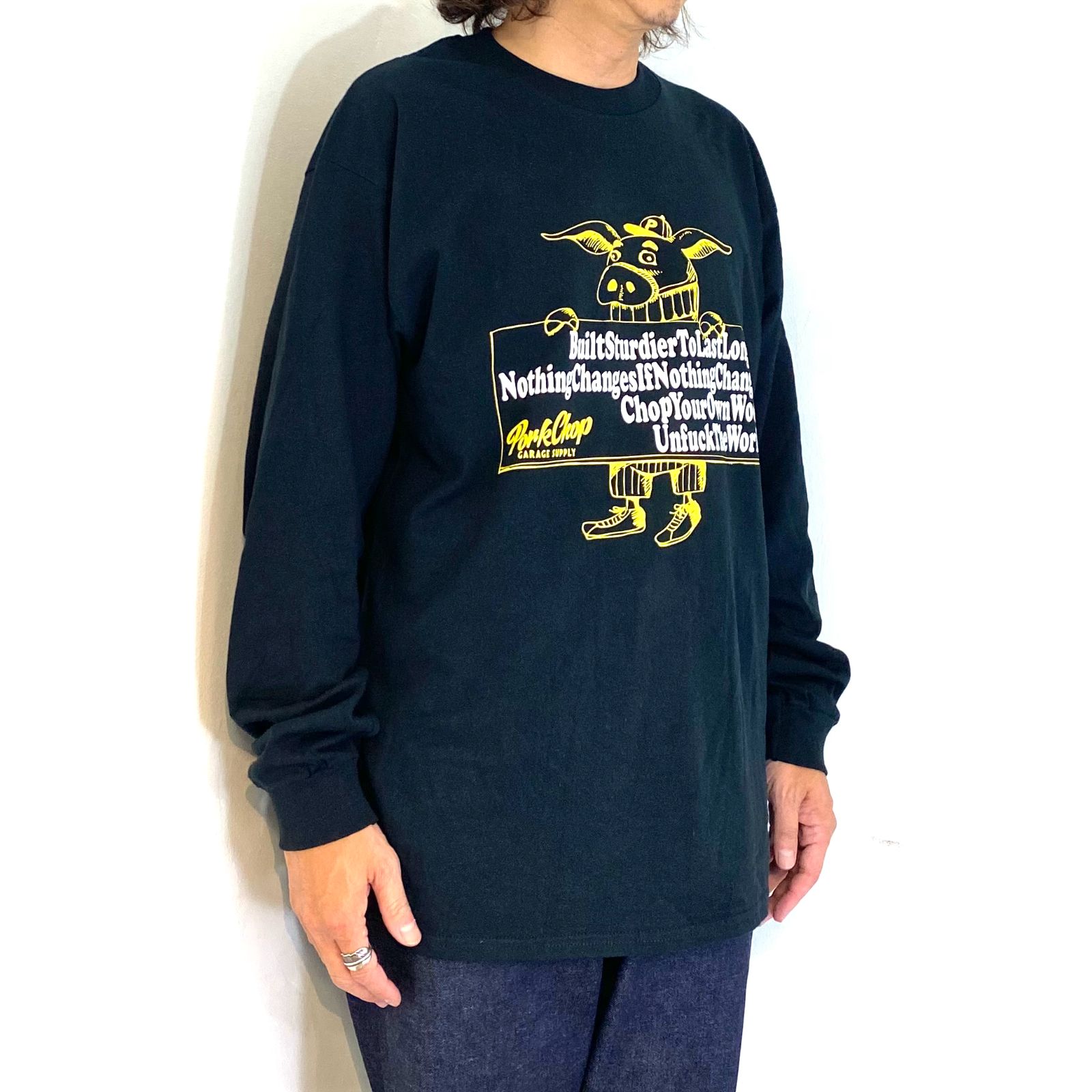 SLOGAN L/S TEE (BLACK) / スローガン ロングスリーブ Tシャツ