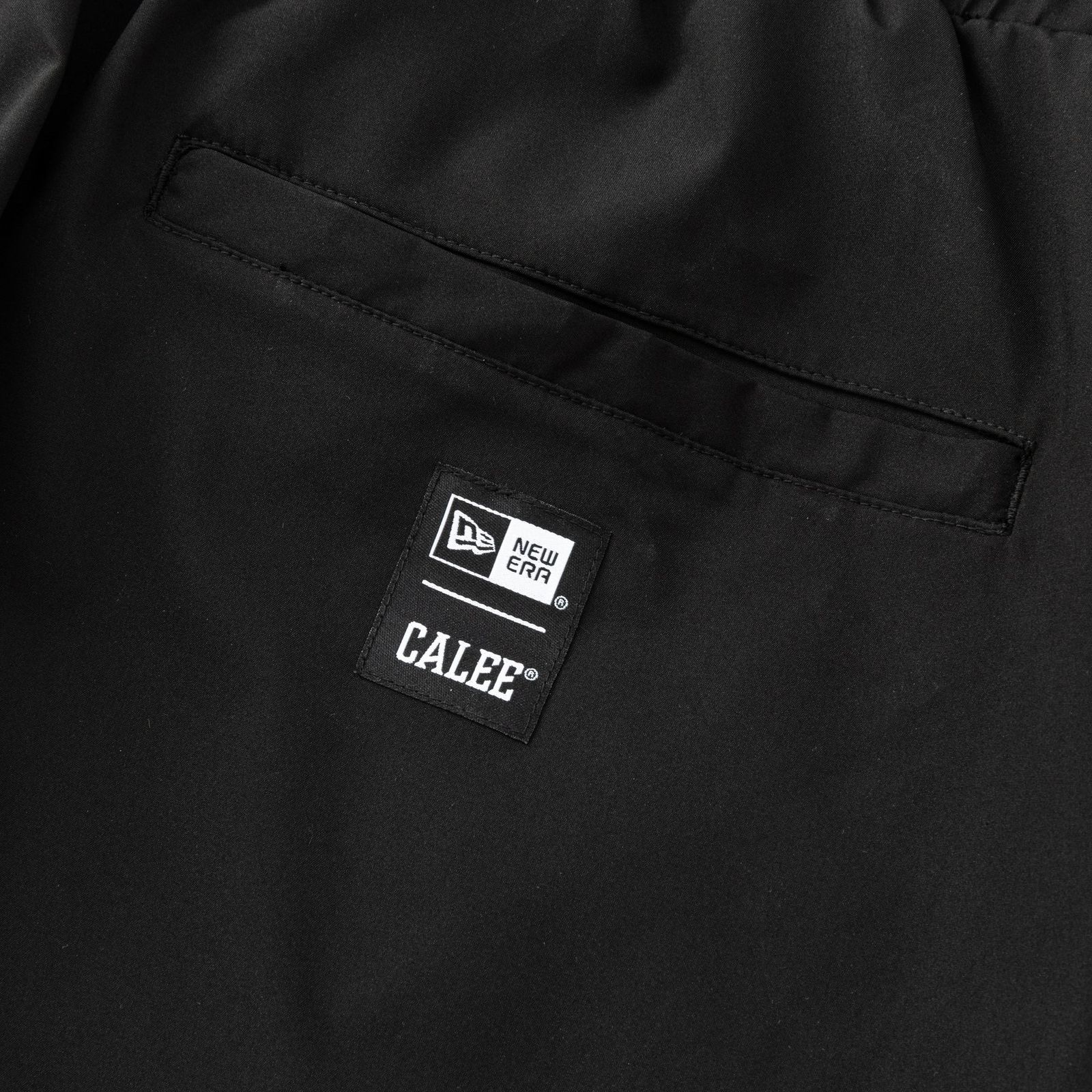 ×NEWERA®︎ CALEE LOGO OVERSIZED PIPING TRACK PANTS (BLACK) / ニューエラ コラボ トラック パンツ / セットアップ可能