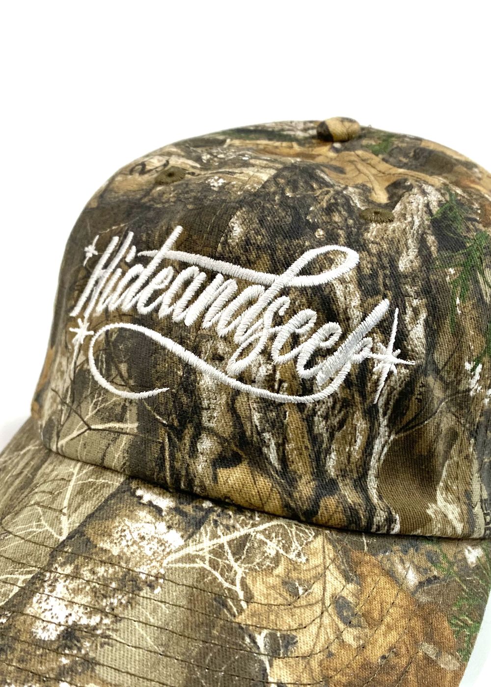Cursive Logo Baseball CAP (REAL TREE CAMO) / 刺繍ロゴ ベースボールキャップ