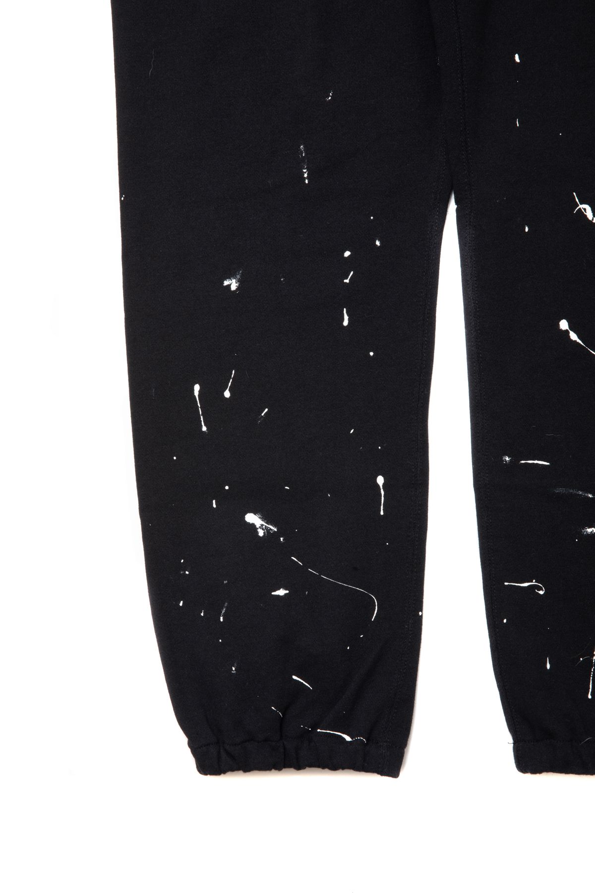 ROTTWEILER - R.W PAINTED SWEAT PANTS (BLACK) / ペイント加工 プリント スウェットパンツ |  LOOPHOLE