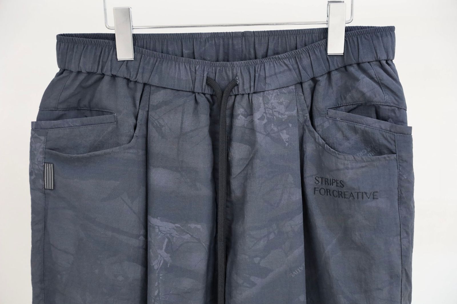 S.F.C 25FW エスエフシー WIDE TAPERED EASY PANTS (REAL TREE CAMO)  (SFCFW25P03)Black Tree Camo