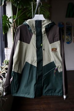 イズネス23SS マウンテンパーカー THM ANNAPURNA MOUNTAIN JACKET(1005SSJK01)GREEN x GREIGE