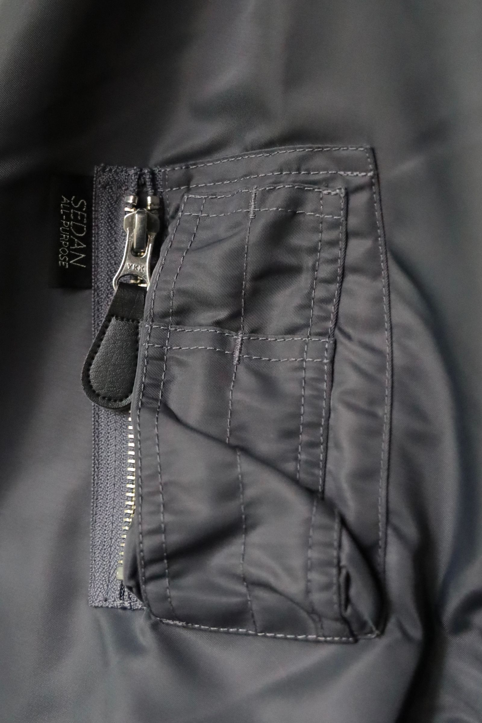 セダンオールパーパス FW24 Reversible CORDURA Flight Jacket(SD24F-JK05) Wolf Grey × Black