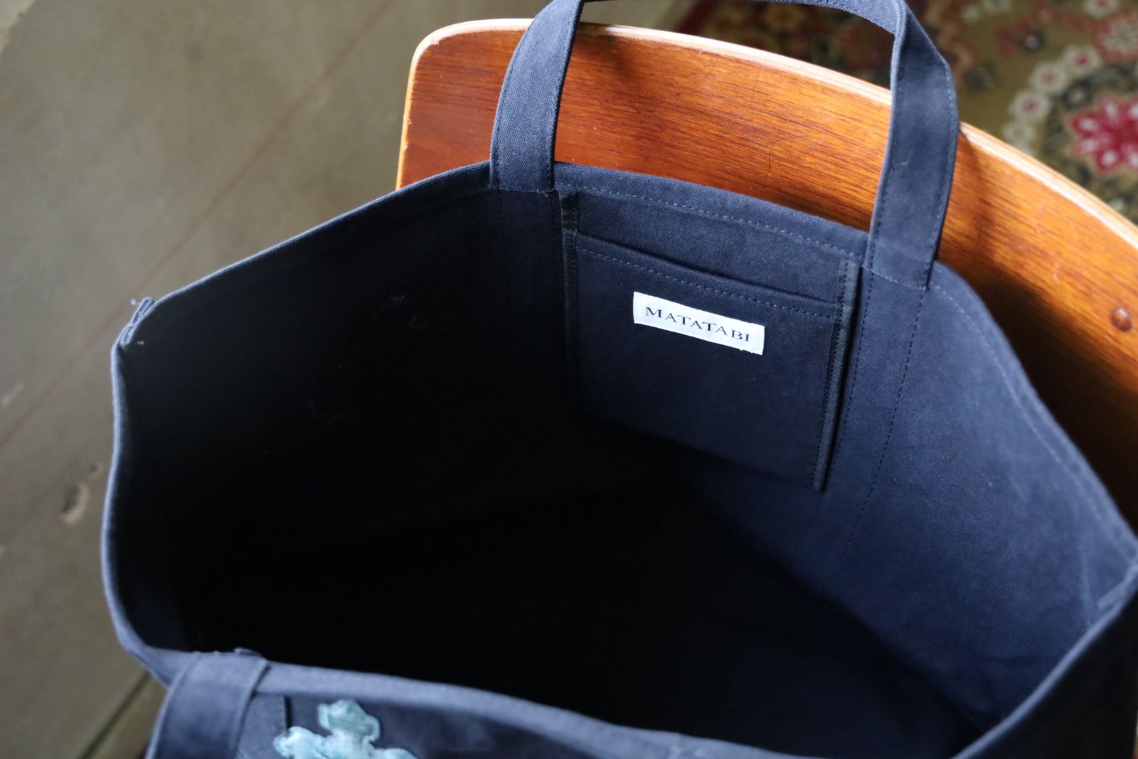 トーキングアバウト ジ アブストラクション 25AW CROSS TOTE BAG L (2526AW-AC-008)BLACK☆新作発売！