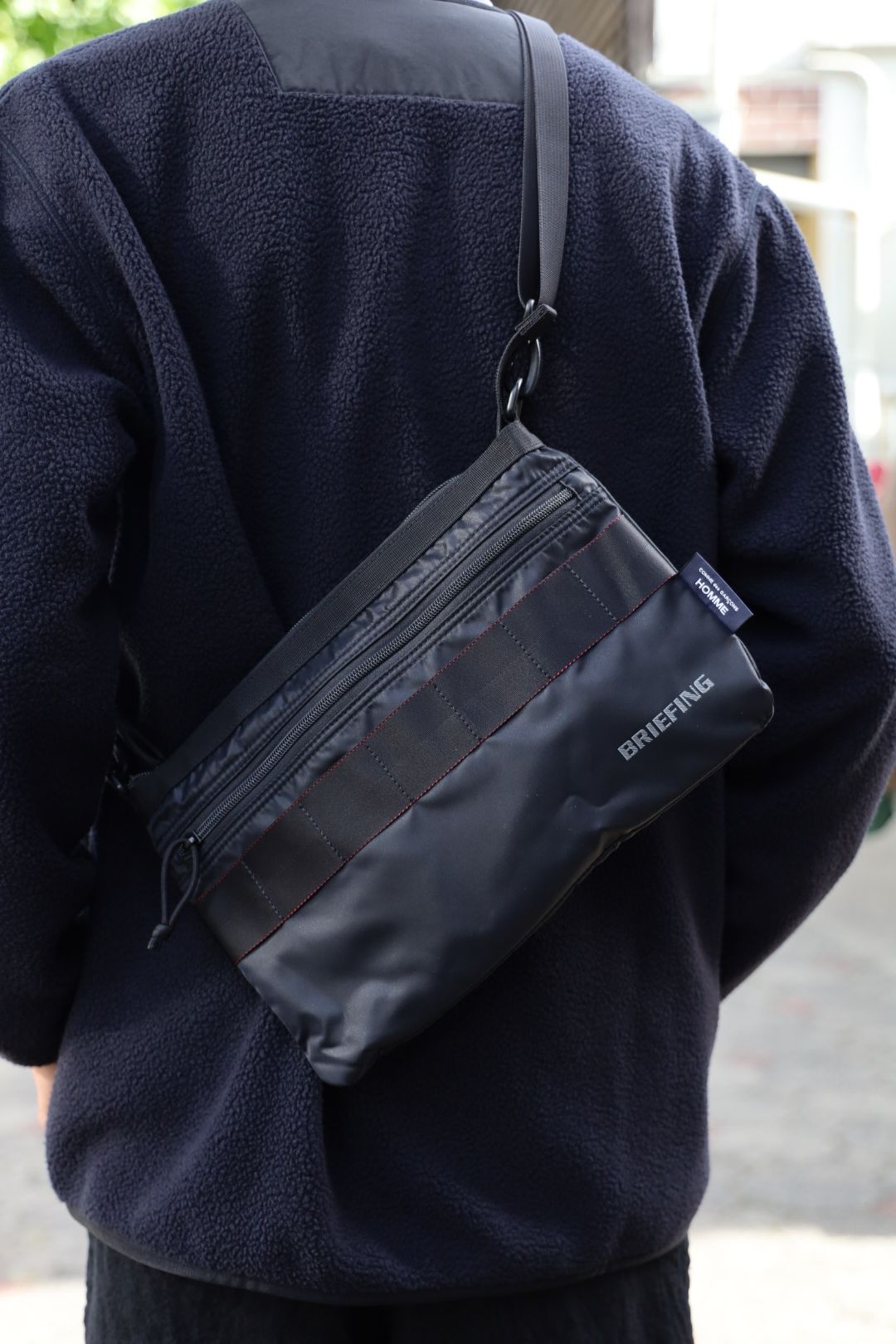 COMME des GARCONS HOMME BRIEFING W-NAME REVERSIBLE SACOCHE x エステルボアライナーカーディガン