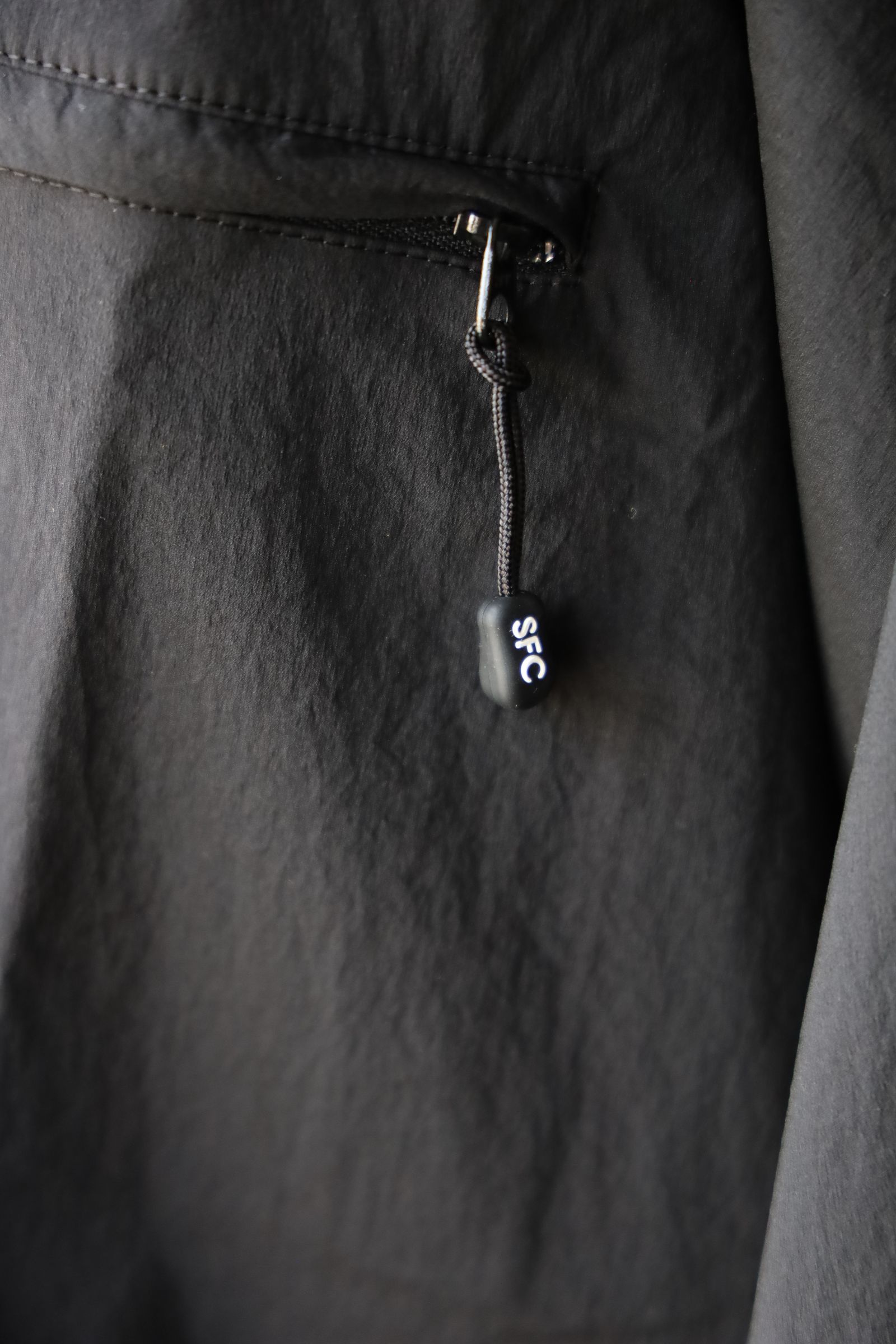 S.F.C 25SS エスエフシー TECH POCKET NYLON SS TEE(SFCSS25S07)Black