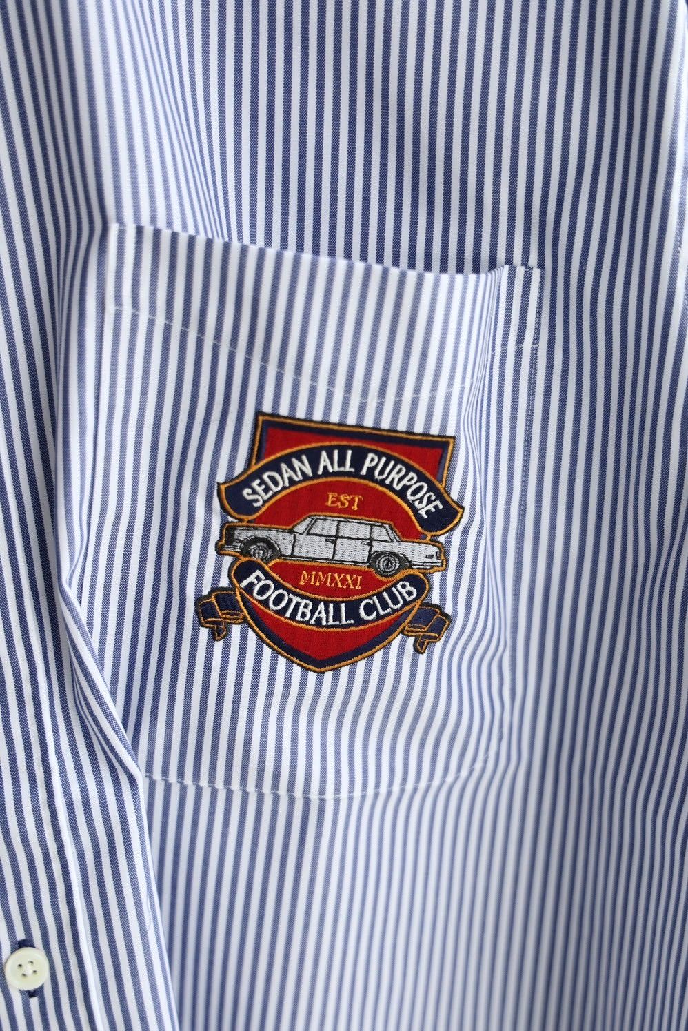 セダンオールパーパス SS25 Emblem BD Shirt(SD25S-SH03)Navy Stripe