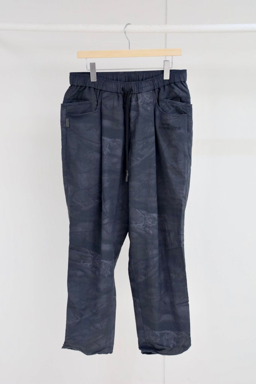 S.F.C 25FW エスエフシー WIDE TAPERED EASY PANTS (REAL TREE CAMO)  (SFCFW25P03)Black Tree Camo