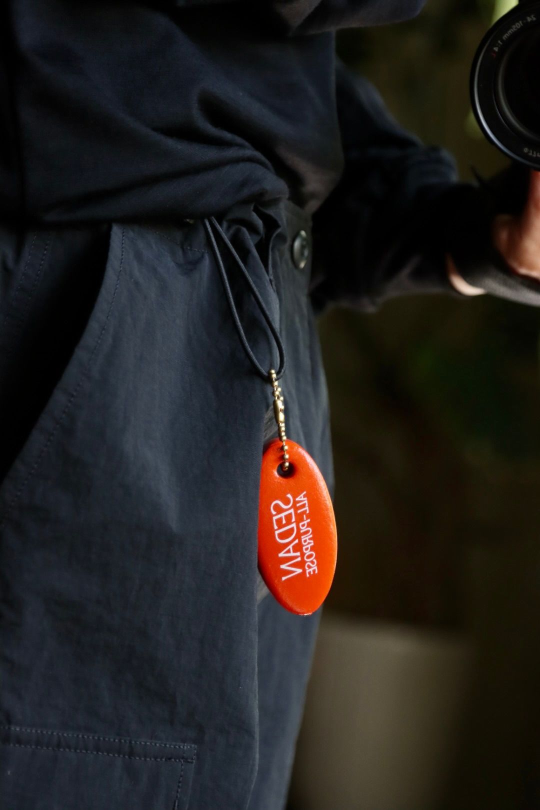 セダンオールパーパス23FW Oval Logo Key Float(SD23F-AC01)Orange