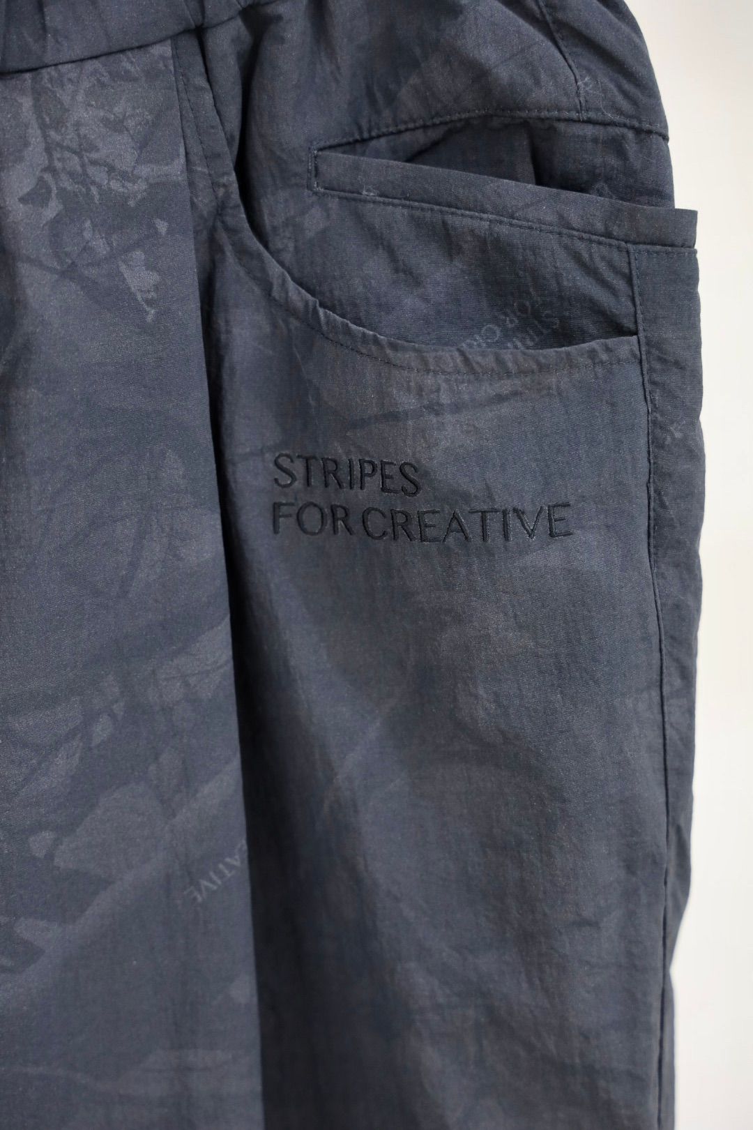 S.F.C 25FW エスエフシー WIDE TAPERED EASY PANTS (REAL TREE CAMO)  (SFCFW25P03)Black Tree Camo