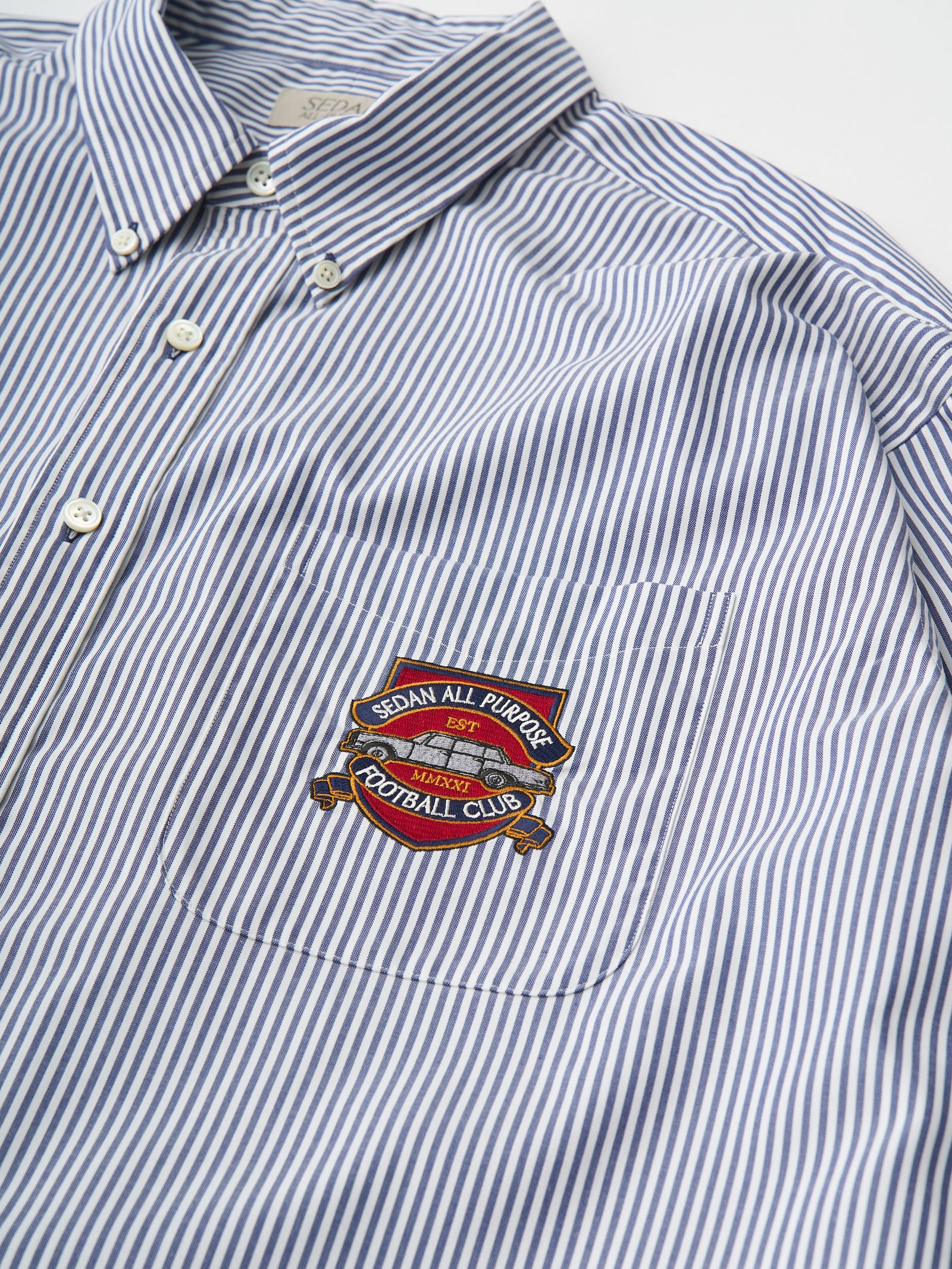 セダンオールパーパス SS25 Emblem BD Shirt(SD25S-SH03)Navy Stripe