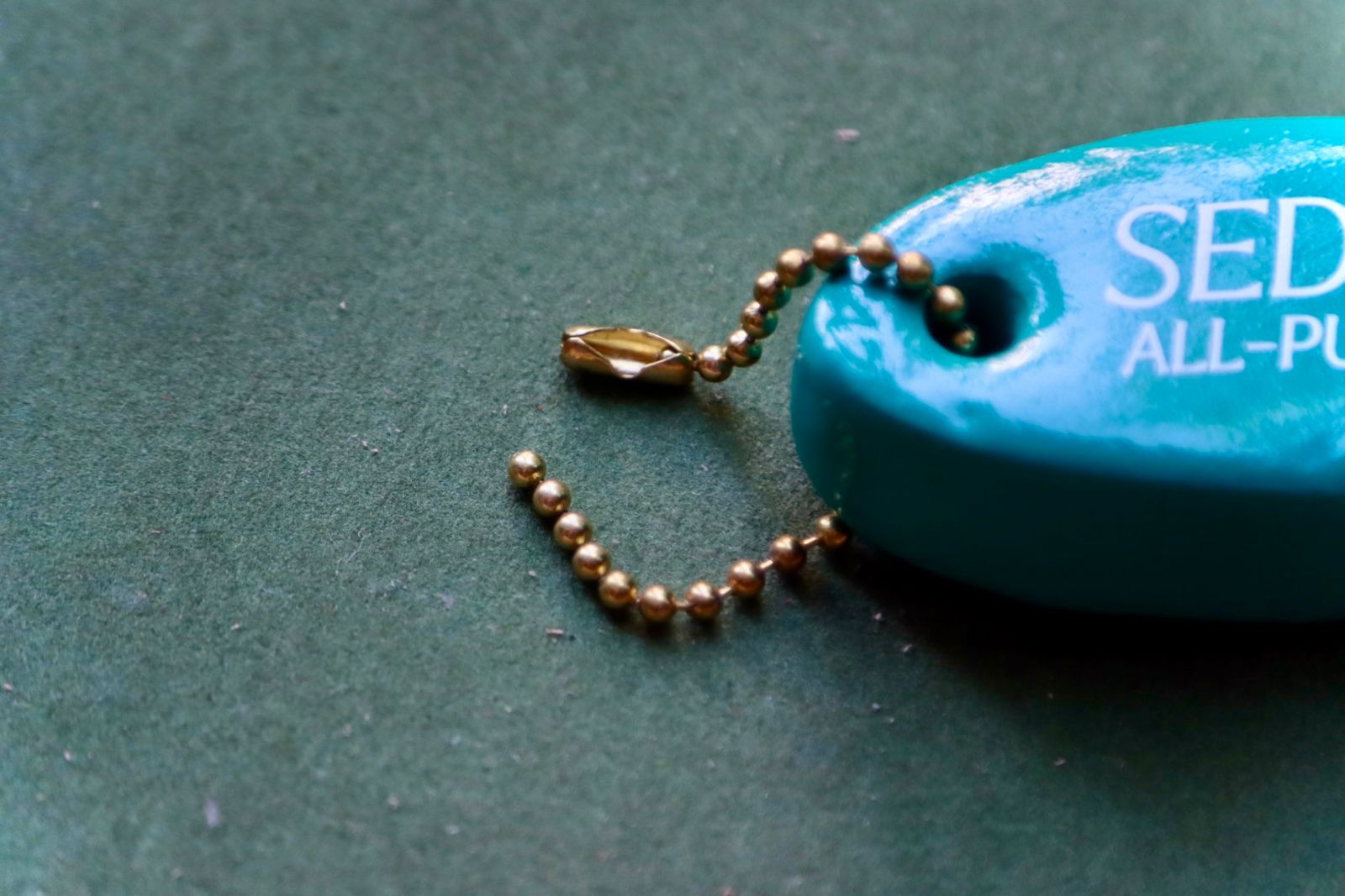セダンオールパーパス23FW Oval Logo Key Float(SD23F-AC01)Teal