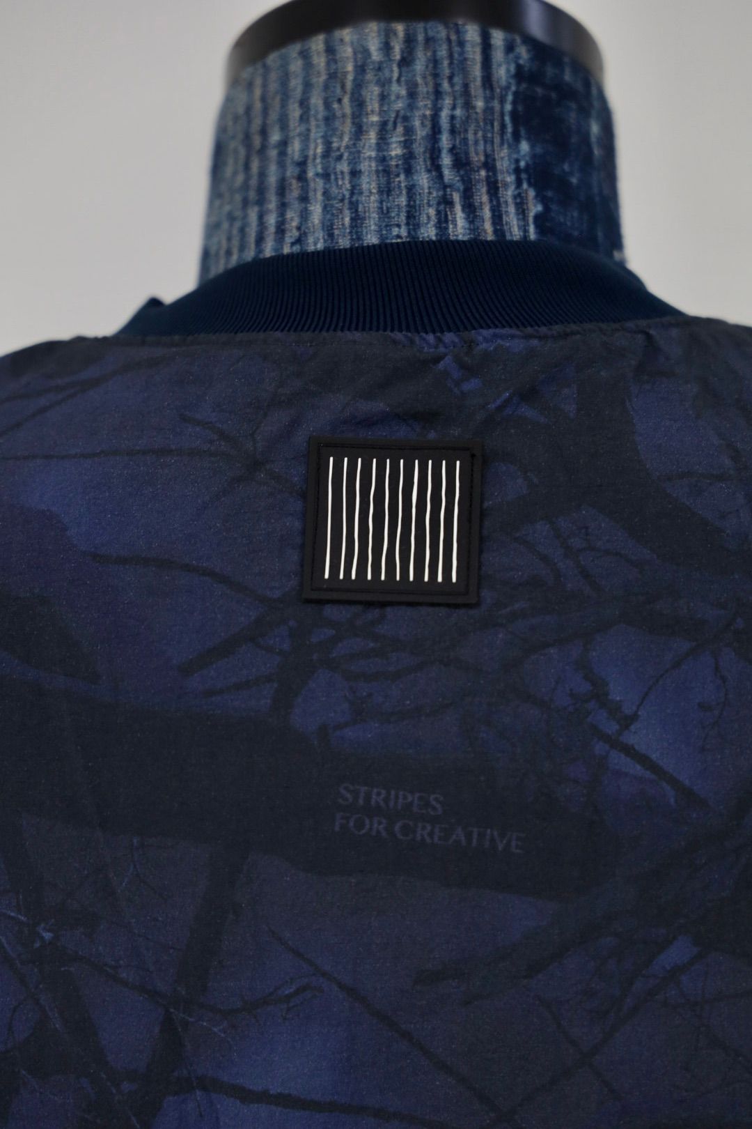 S.F.C 25FW エスエフシー BASEBALL HALF ZIP JACKET (SFCFW25J03)Navy Tree Camo