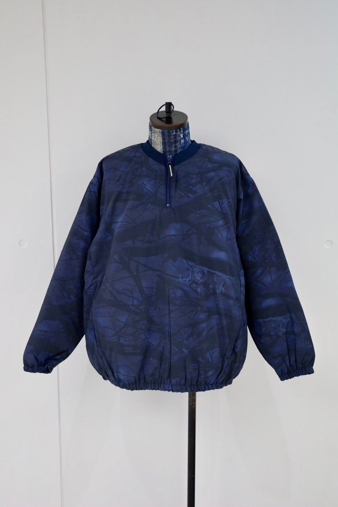 S.F.C 25FW エスエフシー BASEBALL HALF ZIP JACKET (SFCFW25J03)Navy Tree Camo