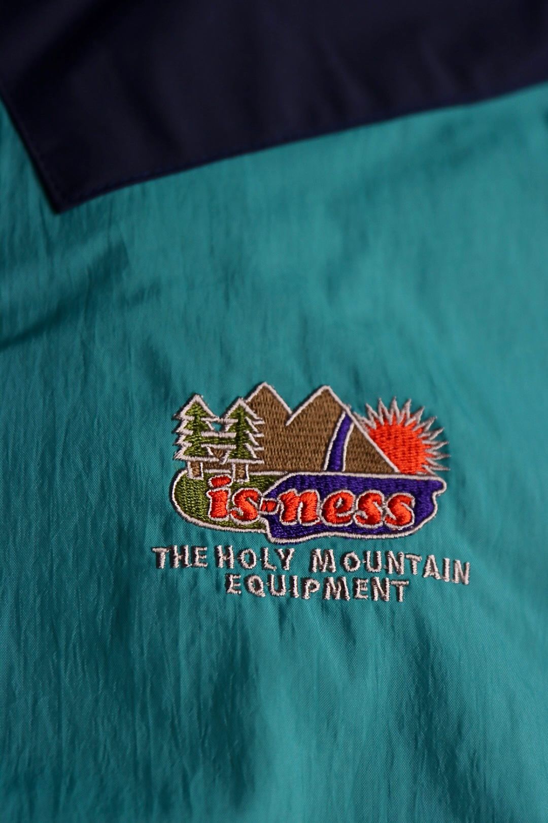 イズネス23SS マウンテンパーカー THM ANNAPURNA MOUNTAIN JACKET(1005SSJK01)PURPLE x BLUE