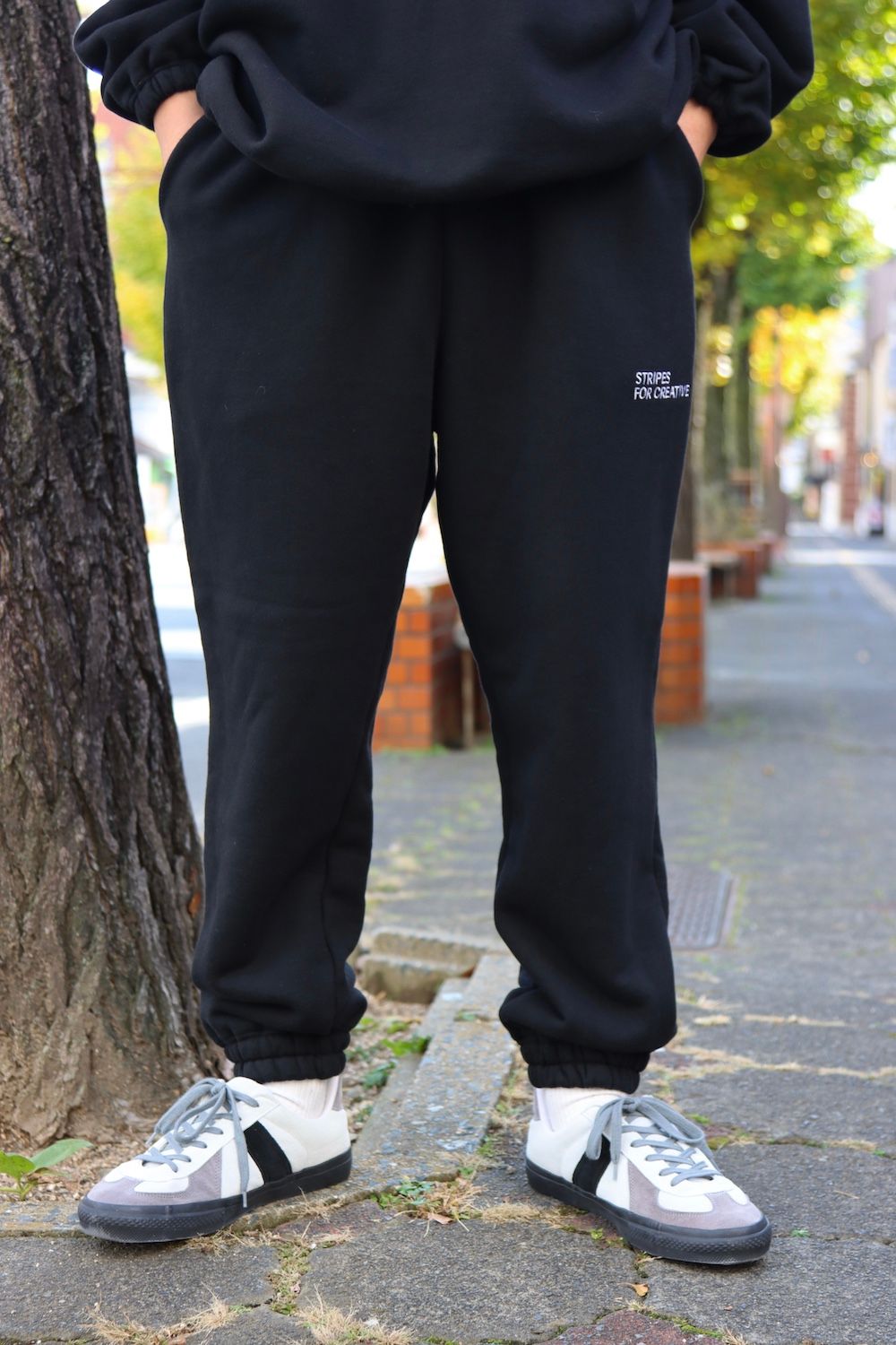 S.F.C HALF ZIP SWEAT(SFCFW21SPCS03),SPORTY SWEAT PANTS