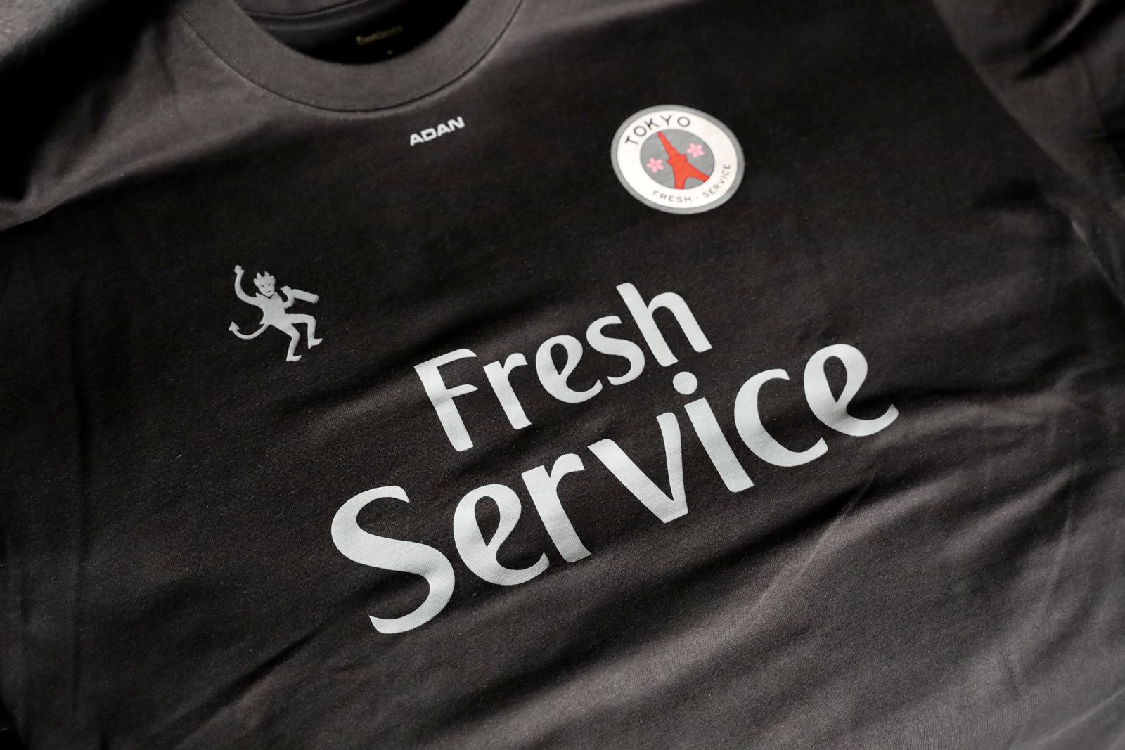 フレッシュサービス CORPORATE PRINTED S/S TEE “FOOTBALL”(BLACK)