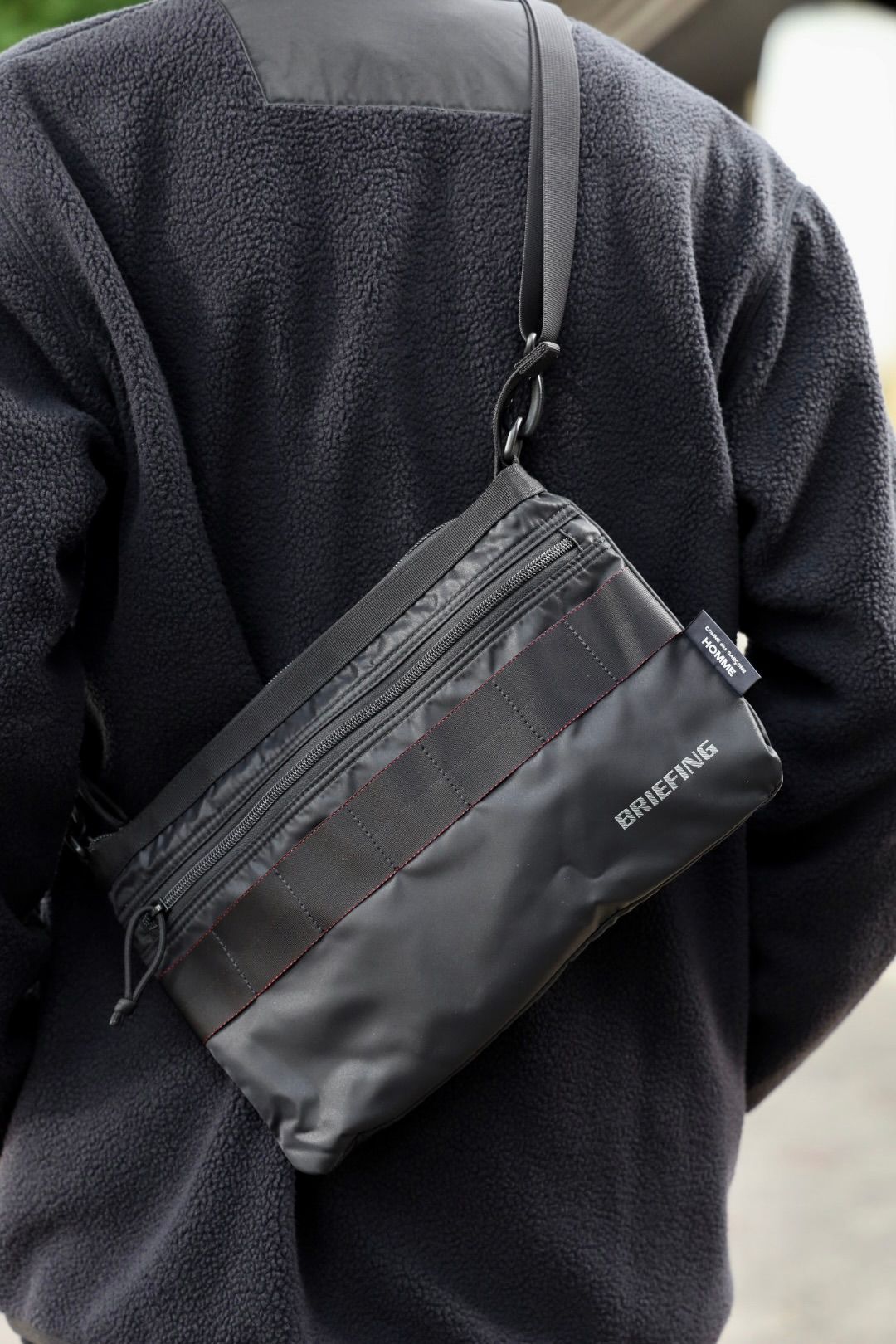 COMME des GARCONS HOMME BRIEFING W-NAME REVERSIBLE SACOCHE x エステルボアライナーカーディガン