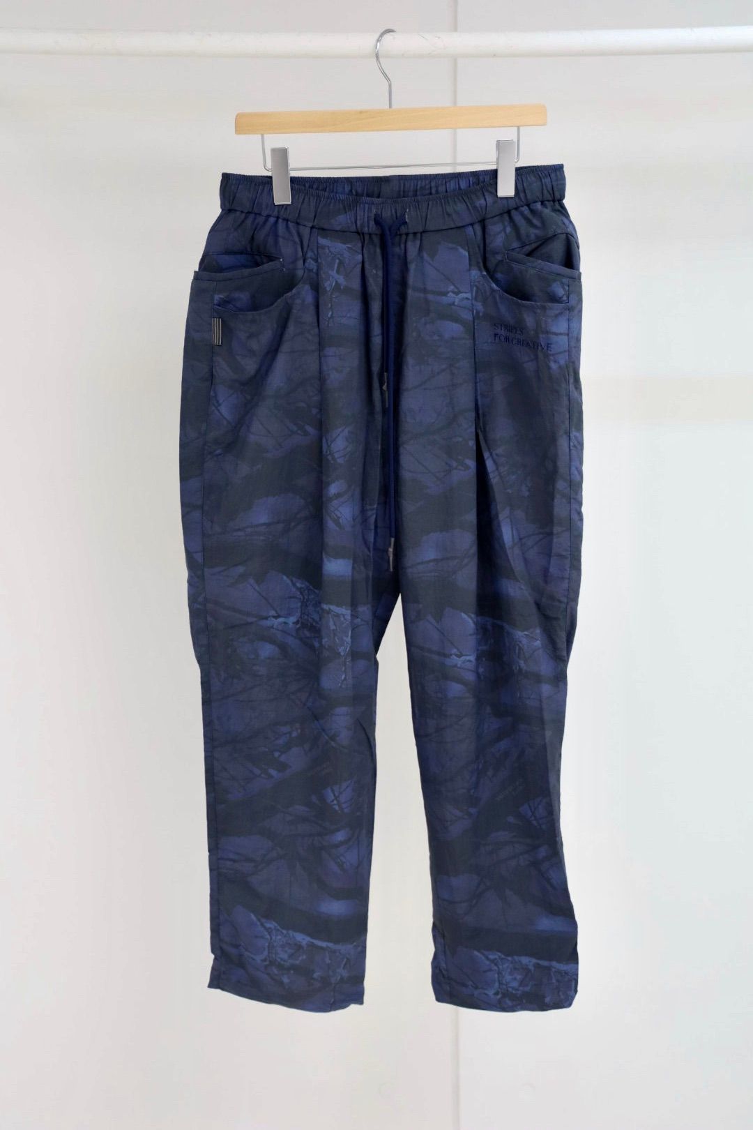 S.F.C 25FW エスエフシー WIDE TAPERED EASY PANTS (REAL TREE CAMO)  (SFCFW25P03)Navy Tree Camo