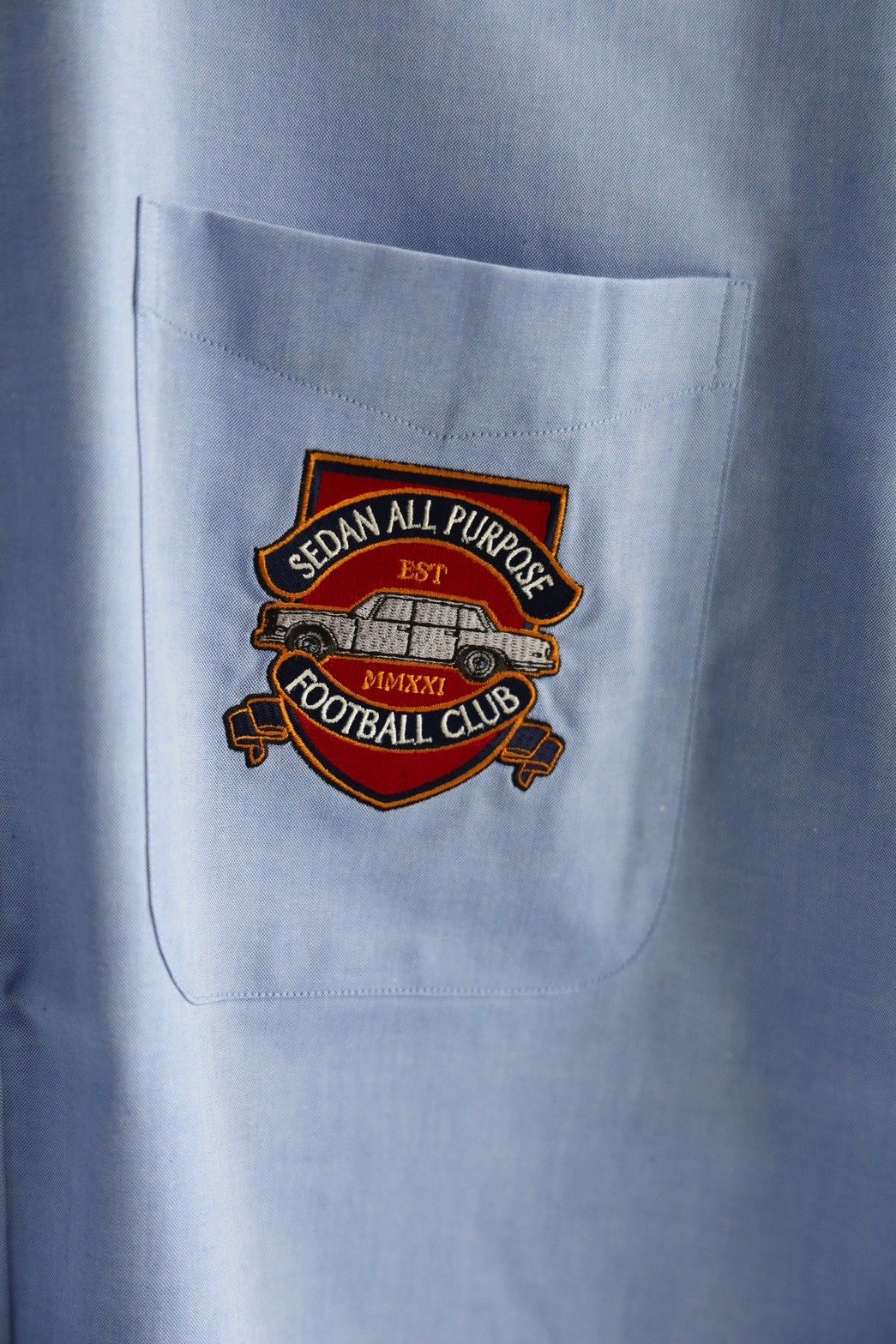 セダンオールパーパス SS25 Emblem BD Shirt(SD25S-SH03)Blue