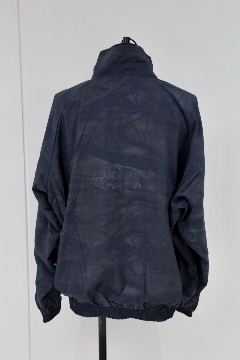 S.F.C 25FW エスエフシー WINDBREAKER JACKET (REAL TREE CAMO) (SFCFW25J06)Black Tree Camo