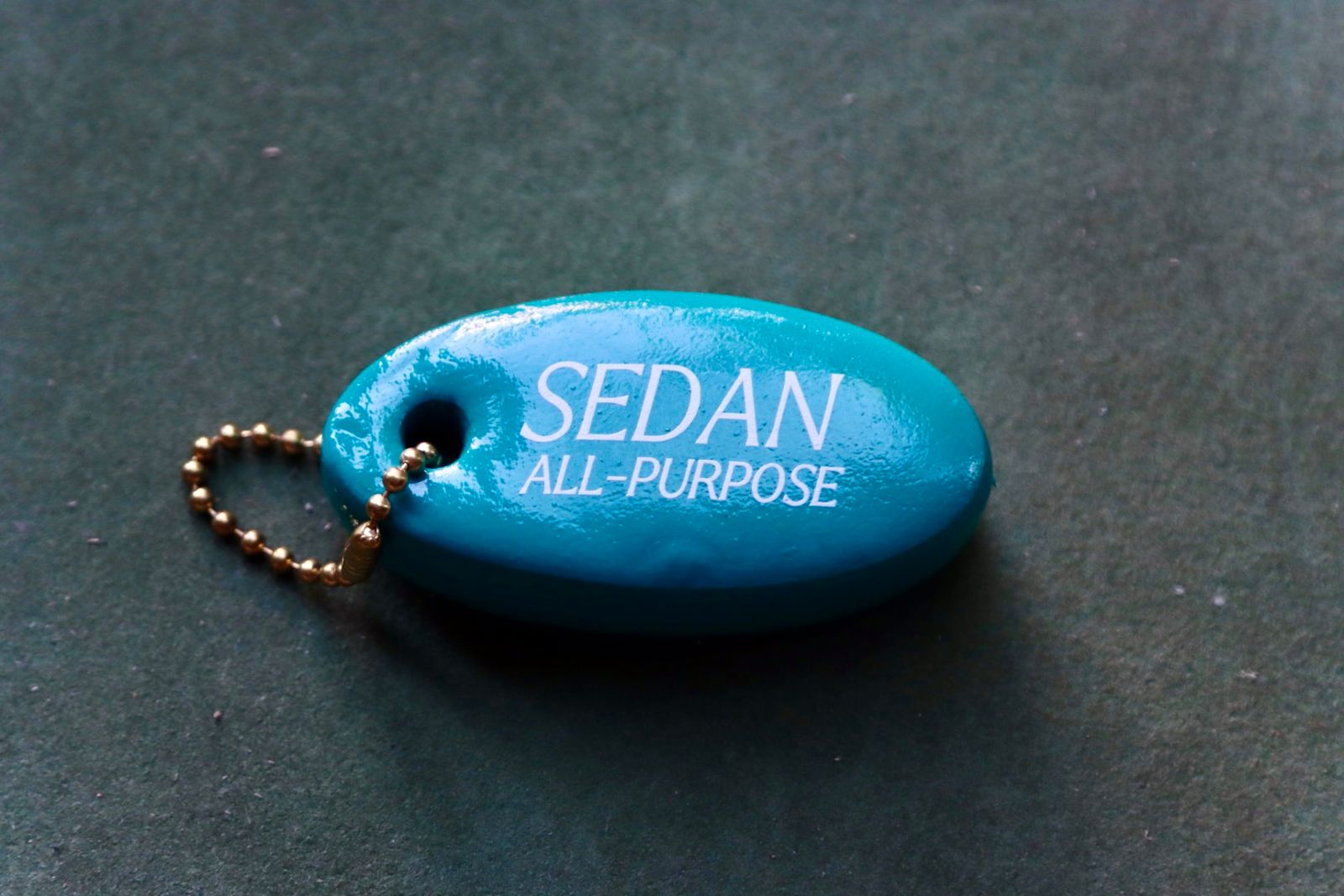 セダンオールパーパス23FW Oval Logo Key Float(SD23F-AC01)Teal