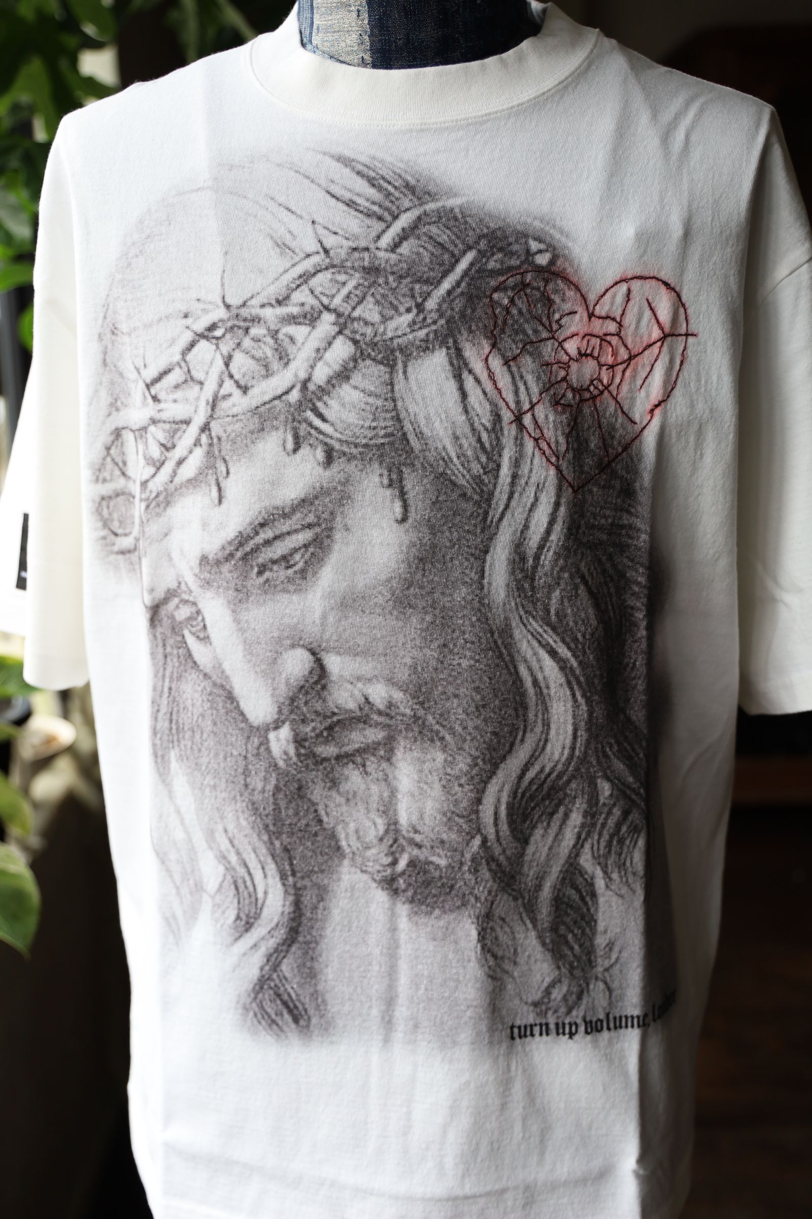 トーキングアバウト ジ アブストラクション 25SS SMUDGE T-SHIRT GOD(NPT-T-008)生成