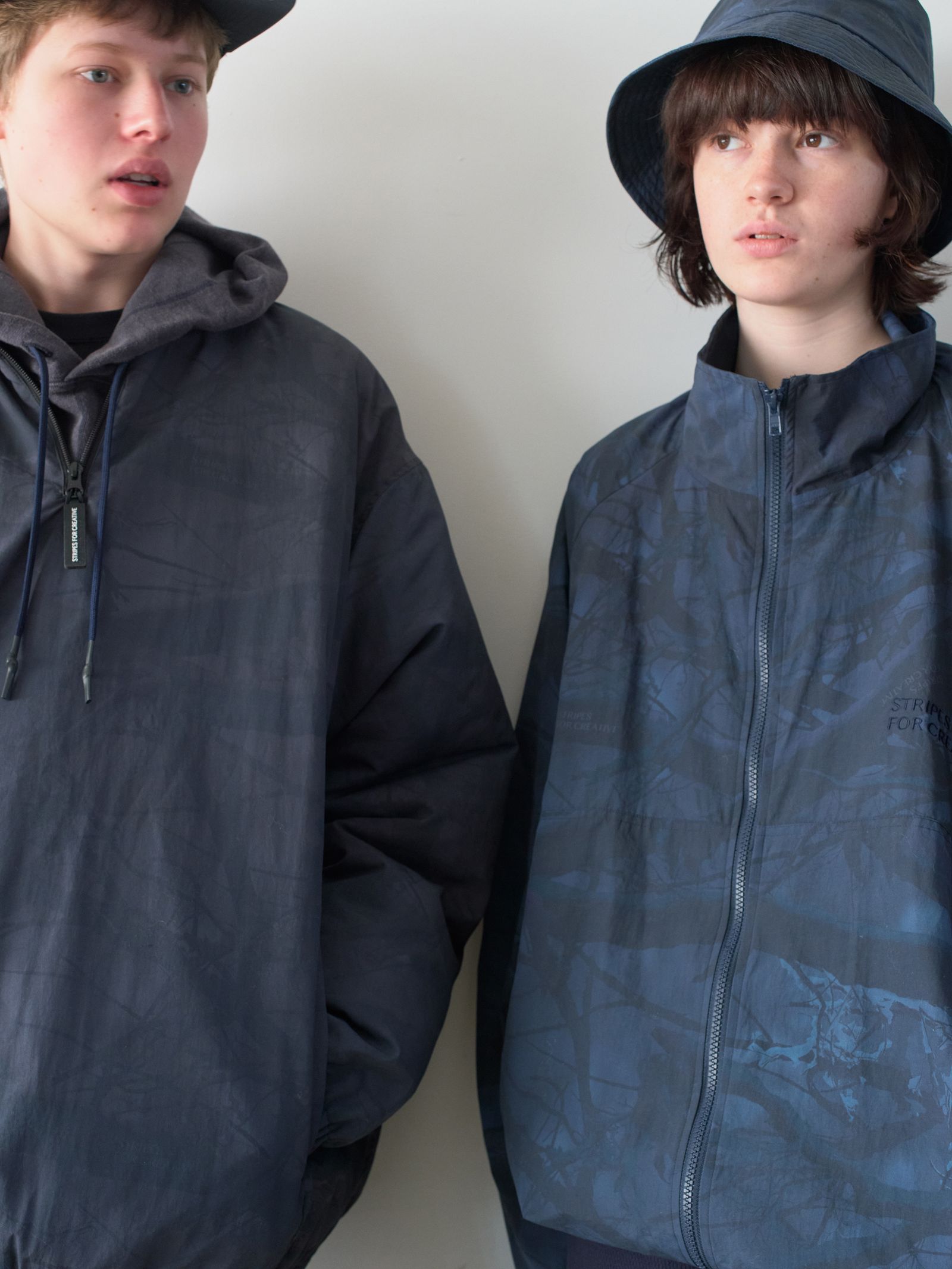 S.F.C 25FW エスエフシー WINDBREAKER JACKET (REAL TREE CAMO) (SFCFW25J06)Black Tree Camo