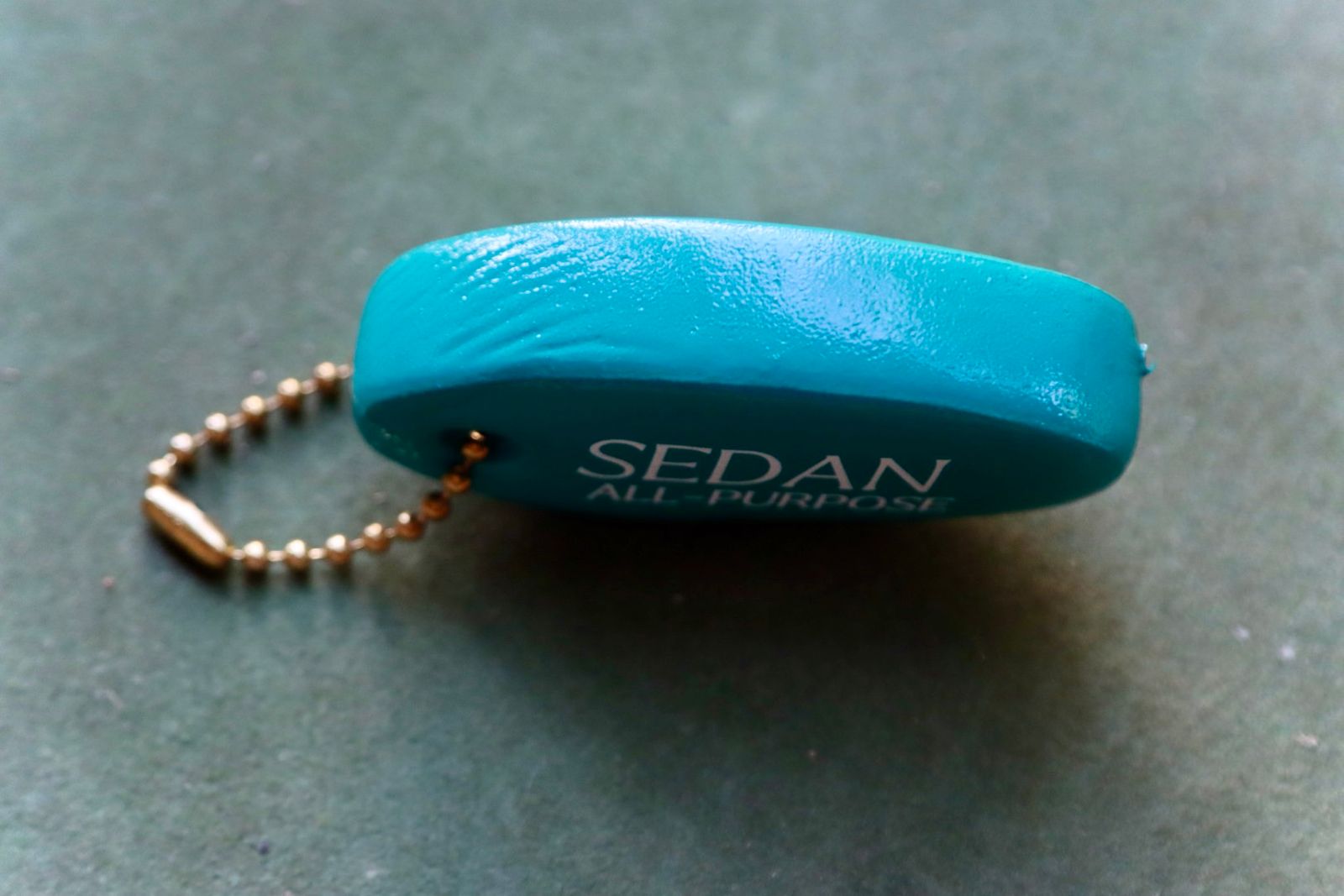 セダンオールパーパス23FW Oval Logo Key Float(SD23F-AC01)Teal