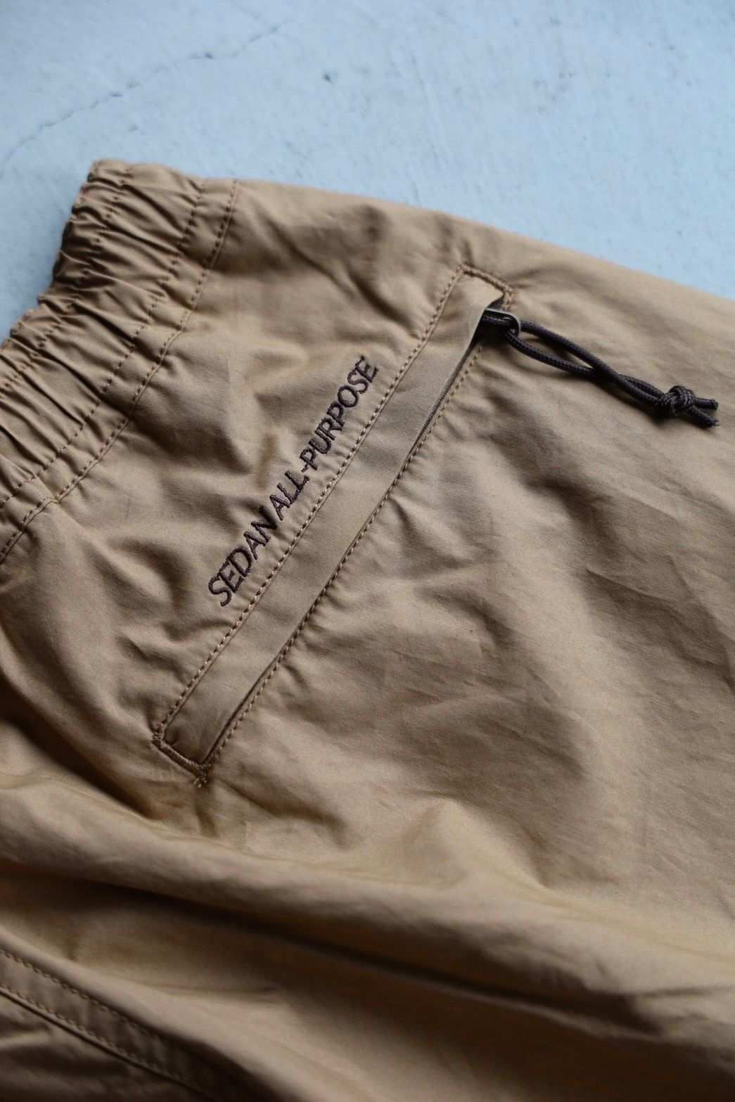 セダンオールパーパス SS25 Typewriter Over Easy Pants(SD25S-PT03)Khaki